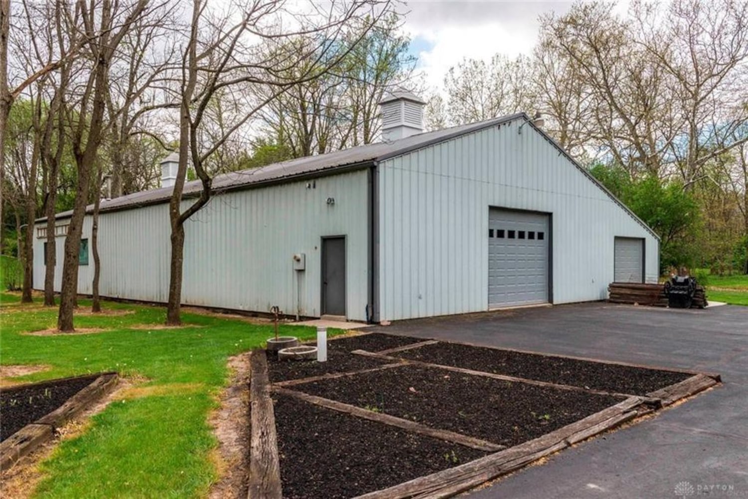 PHOTOS: Nearly 10-acre Miami County property listed has luxury home, stocked fishing pond