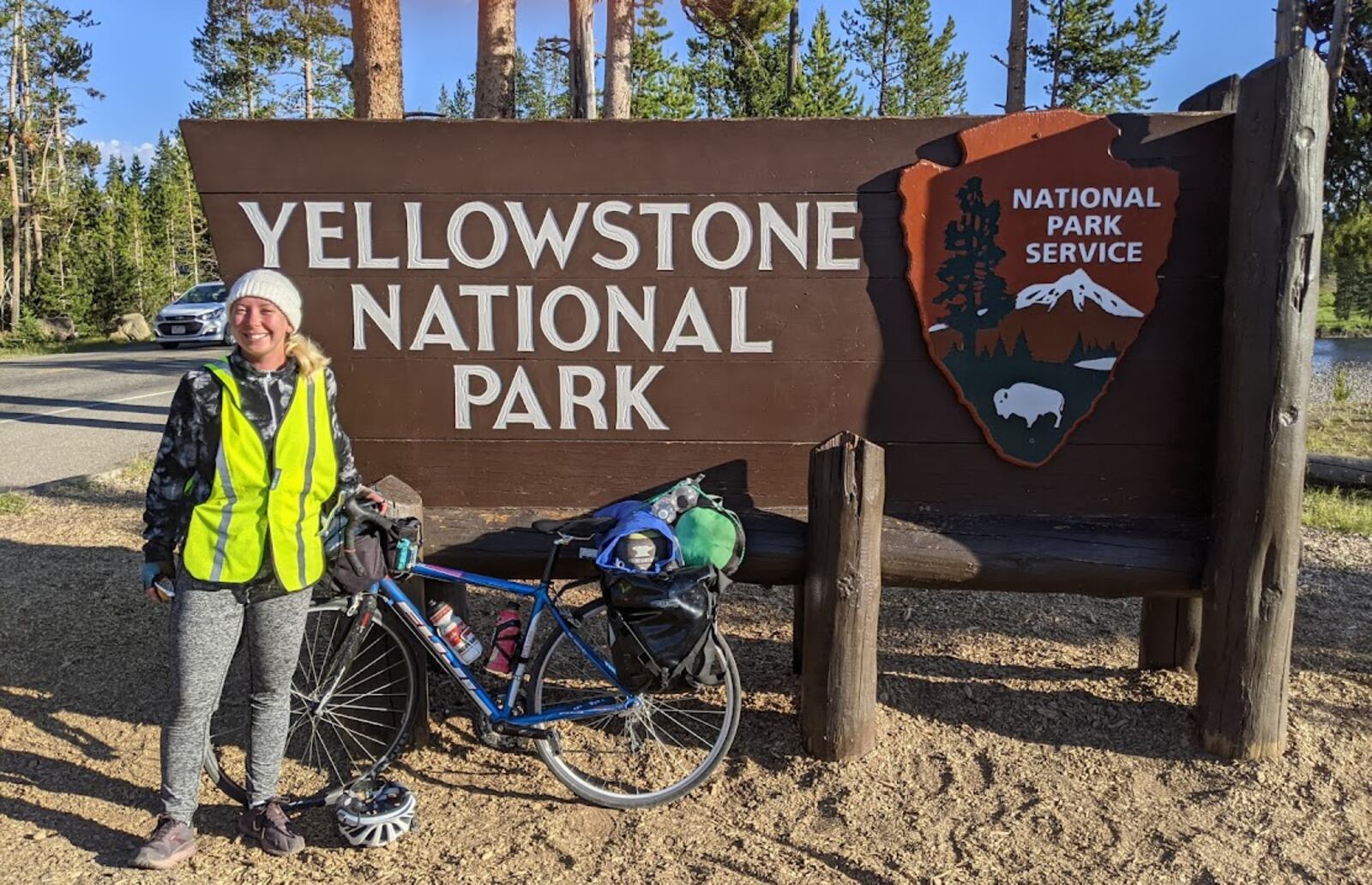 Dayton native Gillian Garland biking through Yellowstone National Park, which is a part of the TransAmerica Bicycle Trail.