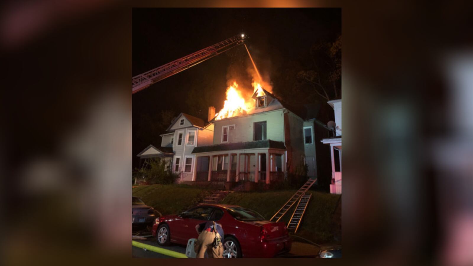 Dayton firefighters battled a flames Thursday morning after a fire spread to several structures on Wroe Avenue. Photo courtesy Dayton Fire Department