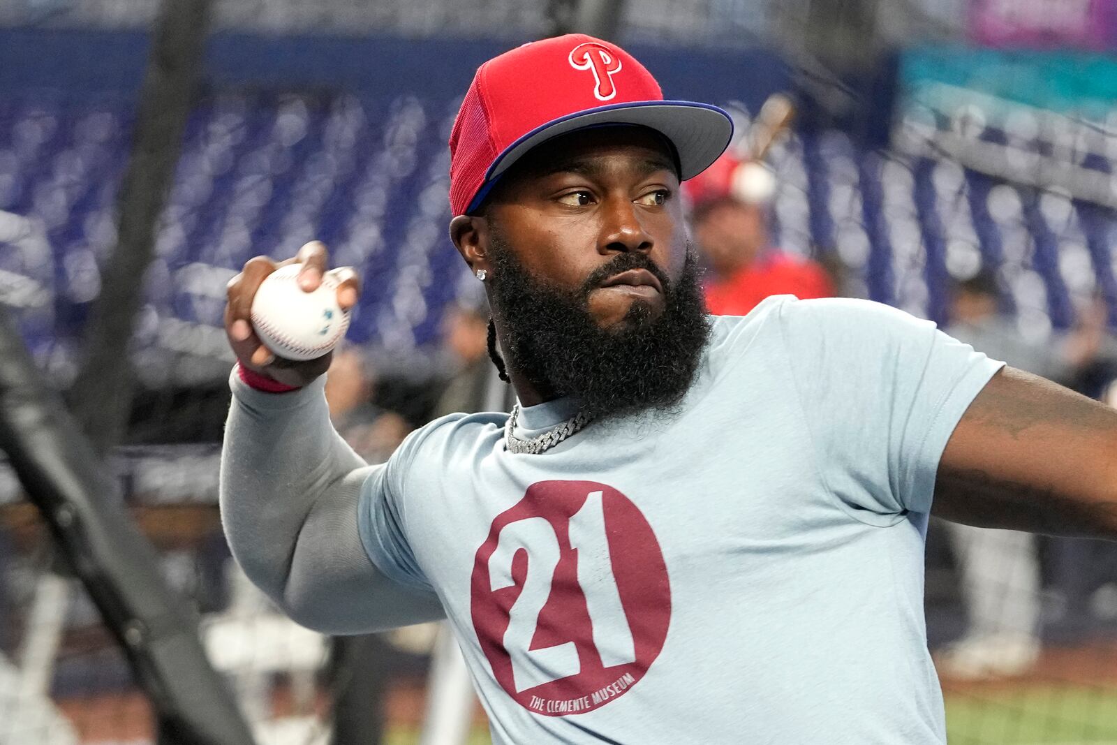 FILE - Philadelphia Phillies' Josh Harrison loosens up before a baseball game against the Miami Marlins, Monday, July 31, 2023, in Miami. The AL West-leading Texas Rangers have signed former two-time All-Star infielder Josh Harrison to a minor league contract. The move comes two weeks after Harrison was released by the Philadelphia Phillies. (AP Photo/Lynne Sladky, File)