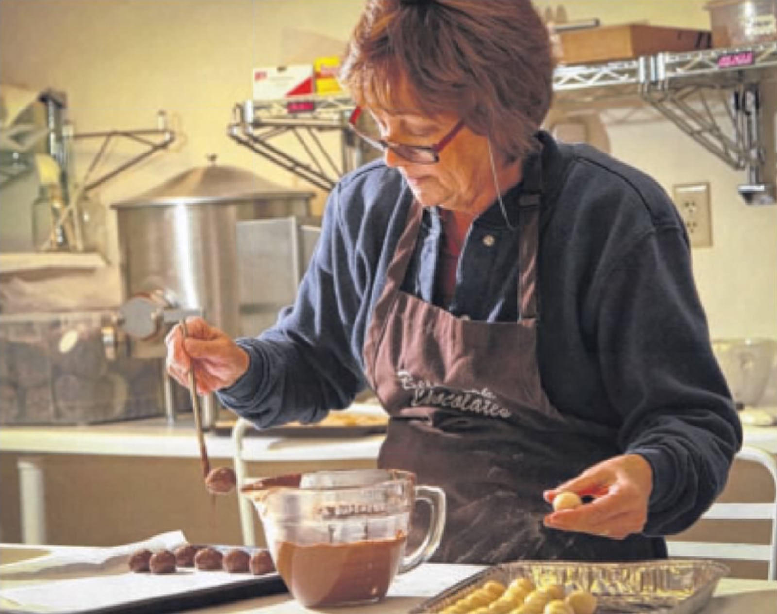 Pictured is longtime employee of Bellbrook Chocolates, Kathy Ball.