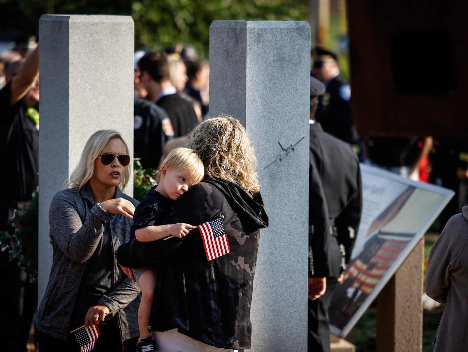 Beavercreek held a September 11 twentieth anniversary ceremony at the 911 Memorial on North Fairfield Rd. Around 200 people attended. JIM NOELKER/STAFF