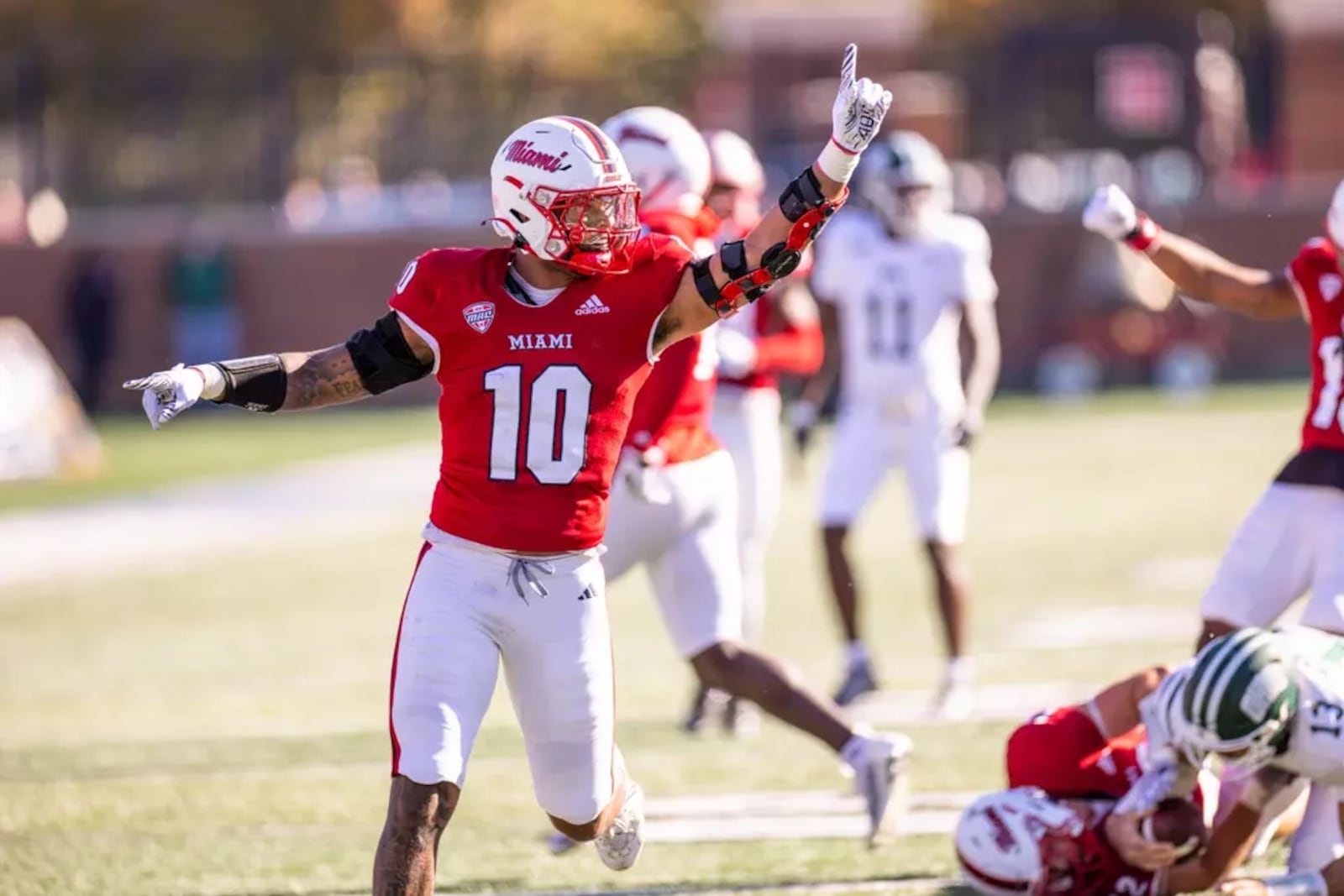 Miami's Ty Wise (10) celebrates a tackle against Ohio earlier this season. Miami Athletics photo