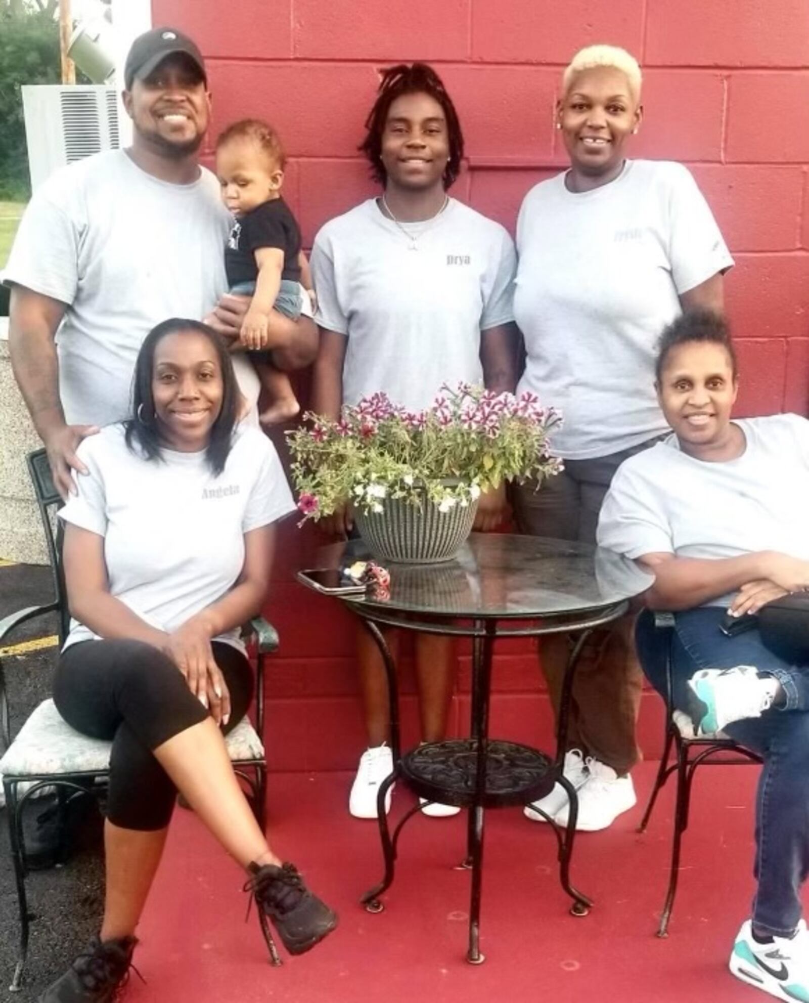 The Dayton Barbecue Company is planning to open in the former spot of Cheeky Meat Pies at 2nd Street Market at the end of March. Pictured is Eric Evans with some of his family (CONTRIBUTED PHOTO).