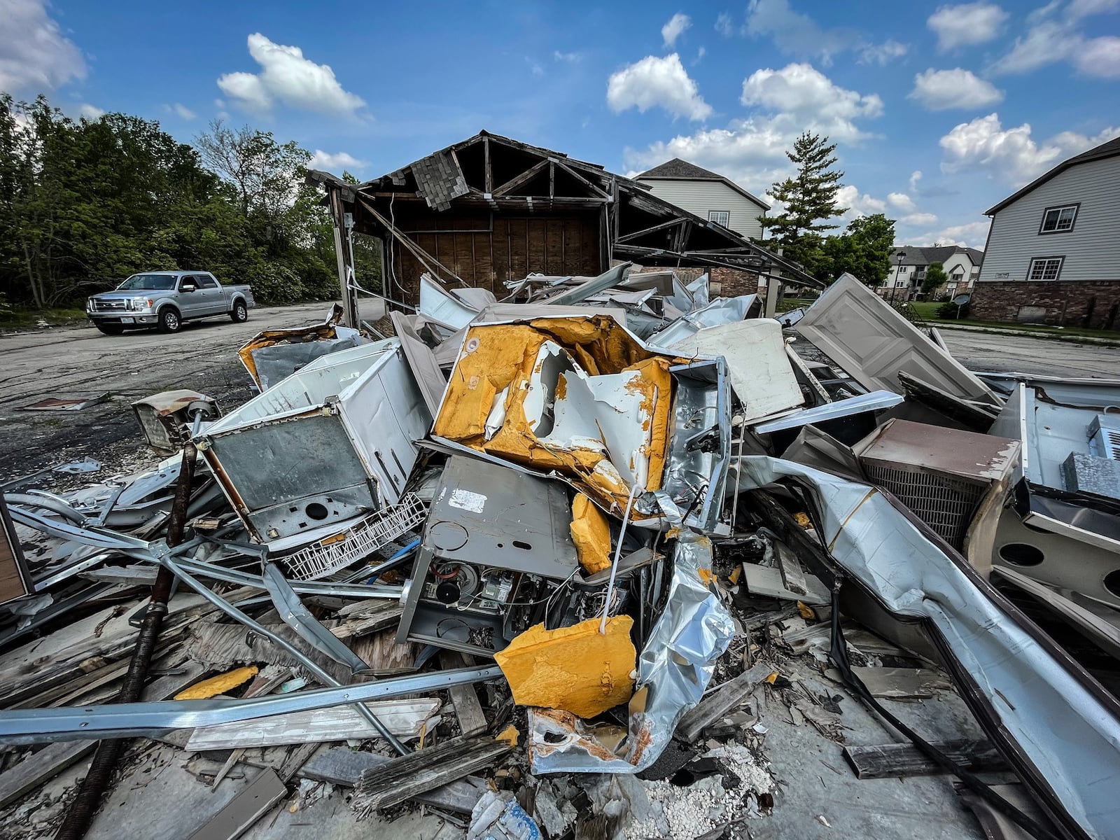 The Woodland Hills Apartments in Trotwood remain in ruins two years after the 2019 Memorial Day tornado. Hundreds of people  were displaced many leaving their belongings behind. JIM NOELKER/STAFF