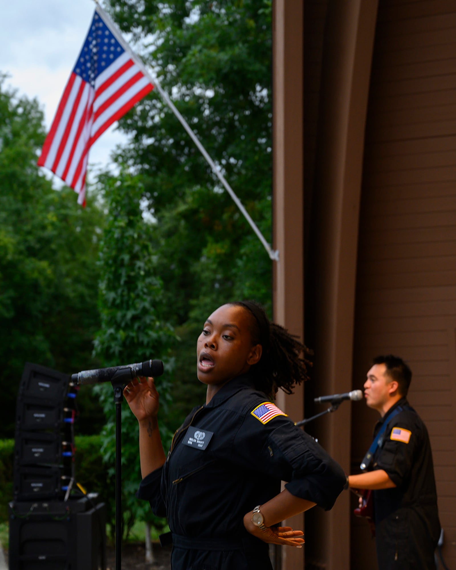 Senior Airman MeLan Smartt and Airman 1st Class Christopher Arellano, along with the rest of the band, perform “Proud Mary,” a song made famous by Tina Turner, during an Aug. 13 concert by Flight One at Centerville Community Amphitheater in Stubbs Park. U.S. AIR FORCE PHOTO/R.J. ORIEZ