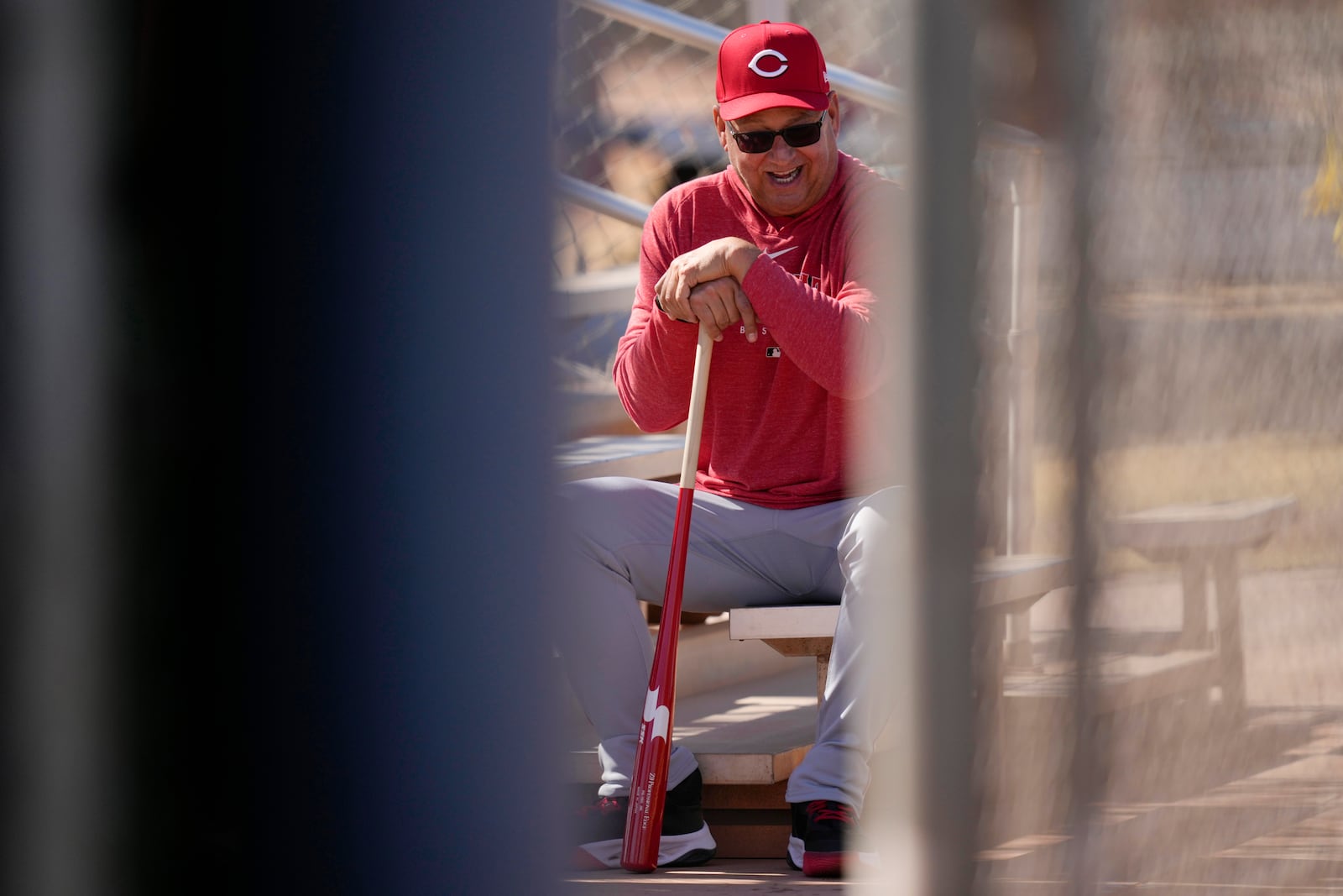 Cincinnati Reds manager Terry Francona laughs during spring training baseball practice at the team's training facility in Goodyear, Ariz., Saturday, Feb. 15, 2025. (AP Photo/Carolyn Kaster)