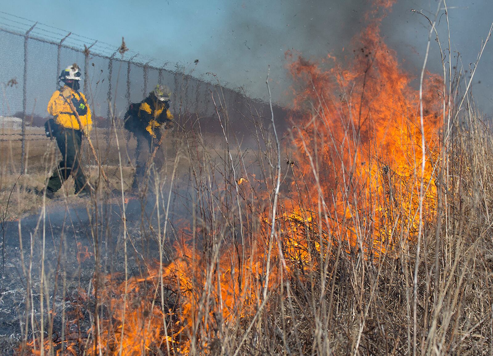 Huffman Prairie, where the Wright brothers learned how to fly, burns near Wright-Patterson Air Force Base Feb. 21, 2020. Members of the Air Force Wildland Fire Branch Wildland Support Module and the Wright-Patt Fire Department, part of the 788th Civil Engineer Squadron, kept an eye on the fire and stopped it from spreading onto the base. U.S. AIR FORCE PHOTO/R.J. ORIEZ