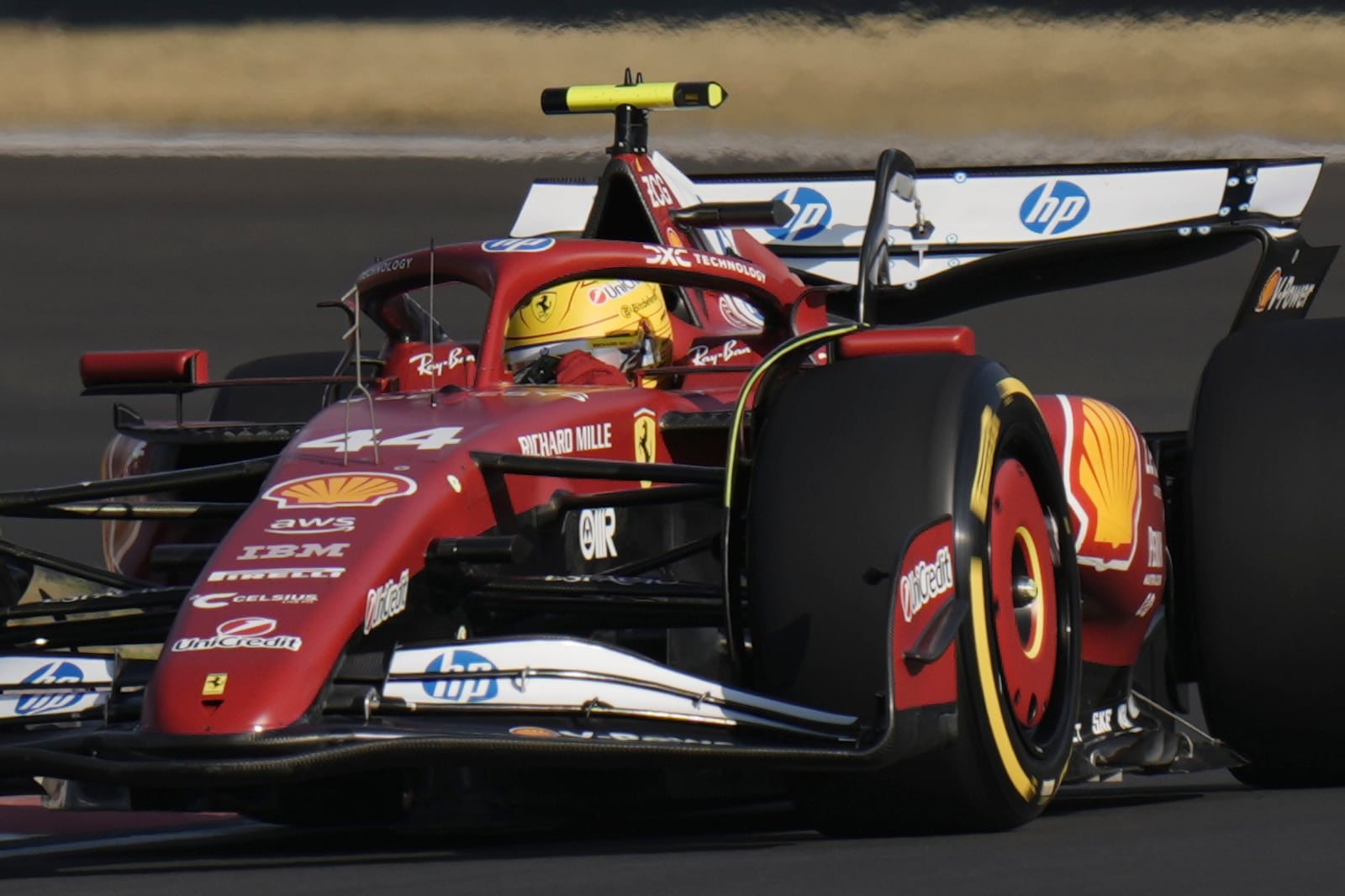 Ferrari driver Lewis Hamilton of Britain steers his car during the sprint qualifying at the Shanghai International Circuit in Shanghai, China, Friday, March 21, 2025, ahead of the Chinese Formula One Grand Prix (Sunday). (AP Photo/Andy Wong)