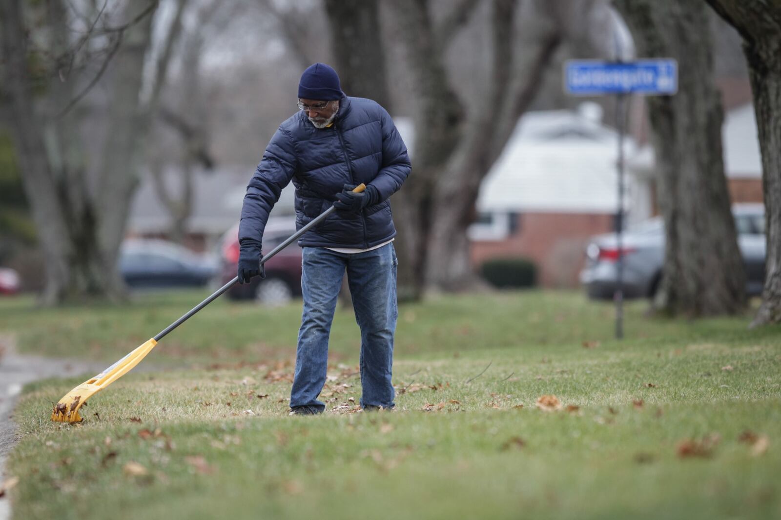 Rev. Wendell Oldham Jr. rakes leaves on his property on Goldengate Dr. in Centerville Monday Jan. 4, 2021. Property  owners will soon receive property tax bill for 2021 in the mail. JIM NOELKER/STAFF