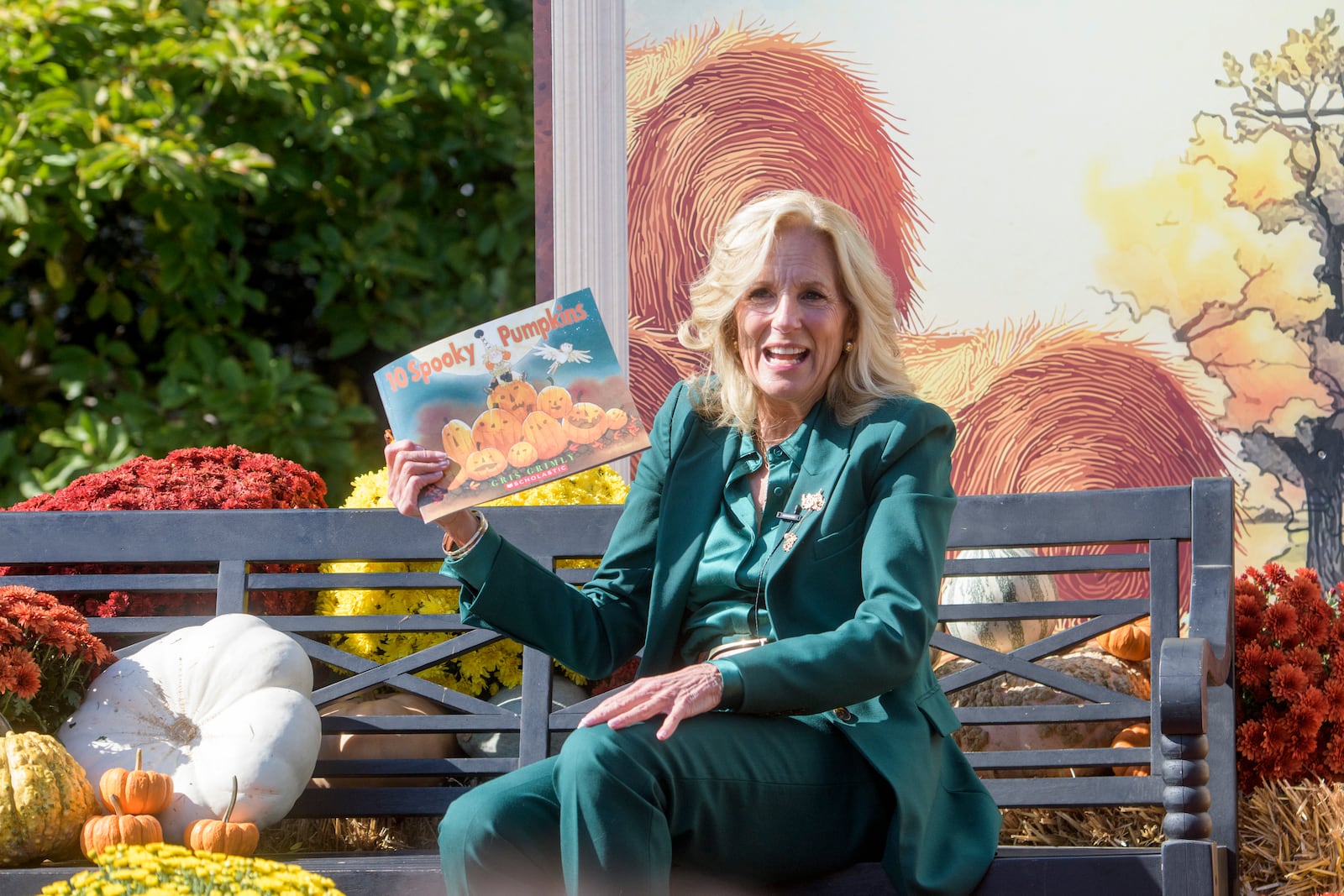 First lady Jill Biden participates in a "Hallo-READ" story-time session by reading the book "10 Spooky Pumpkins" by Gris Grimly to children on the South Lawn of the White House in Washington, Wednesday, Oct. 30, 2024. (AP Photo/Rod Lamkey, Jr.)