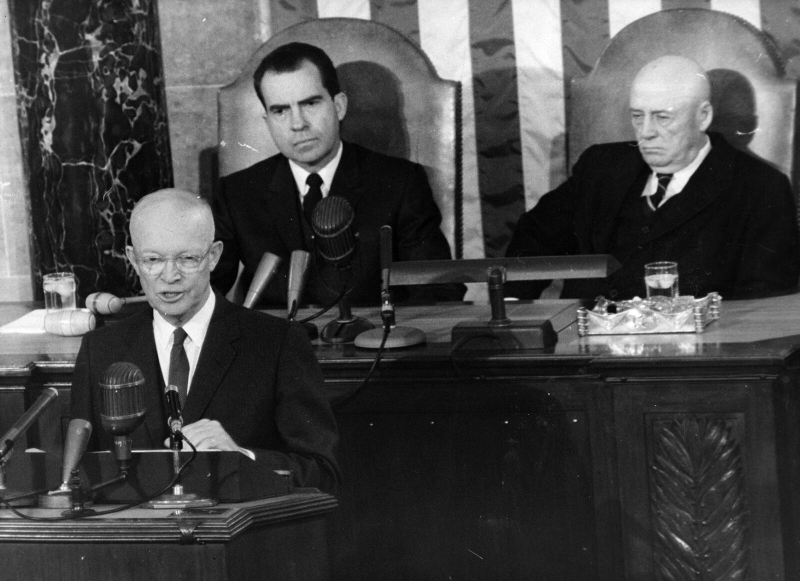 9th January 1960:  The American General and 34th President of the United States, Dwight D Eisenhower (1890 - 1969), giving his State of the Union address at the US Congress in Washington.  Behind him, on the left, is Vice-President Richard Nixon, and Sam Rayburn, the Speaker of the House.  (Photo by Keystone/Getty Images)