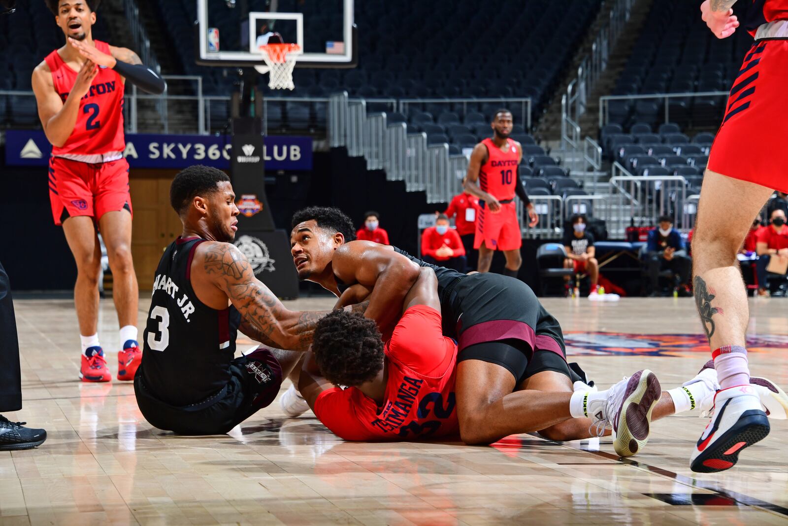 Dayton's Jordy Tshimanga competes for a loose ball against Mississippi State on Saturday, Dec. 12, 2020, at State Farm Arena in Atlanta. Photo by Scott Cunningham