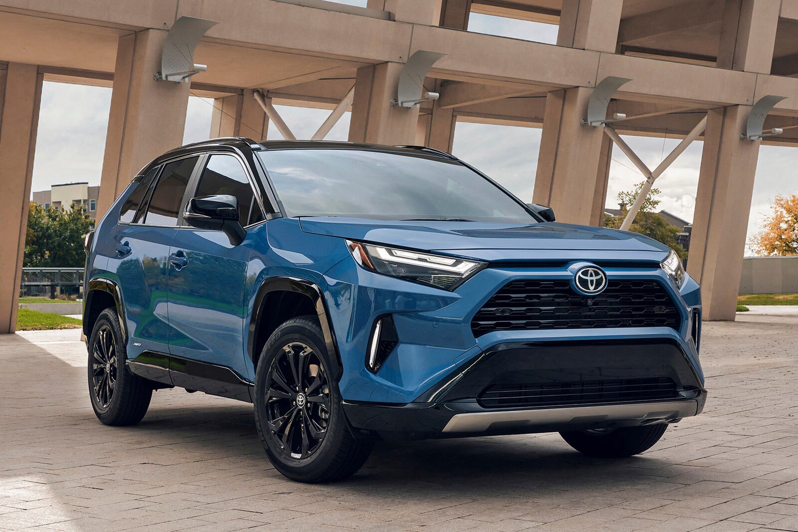 This photo provided by Toyota shows the RAV4 Hybrid, which has long been the go-to for hybrid SUV buyers thanks to its excellent fuel economy and roomy interior. (Courtesy of Toyota Motor Sales U.S.A. via AP)