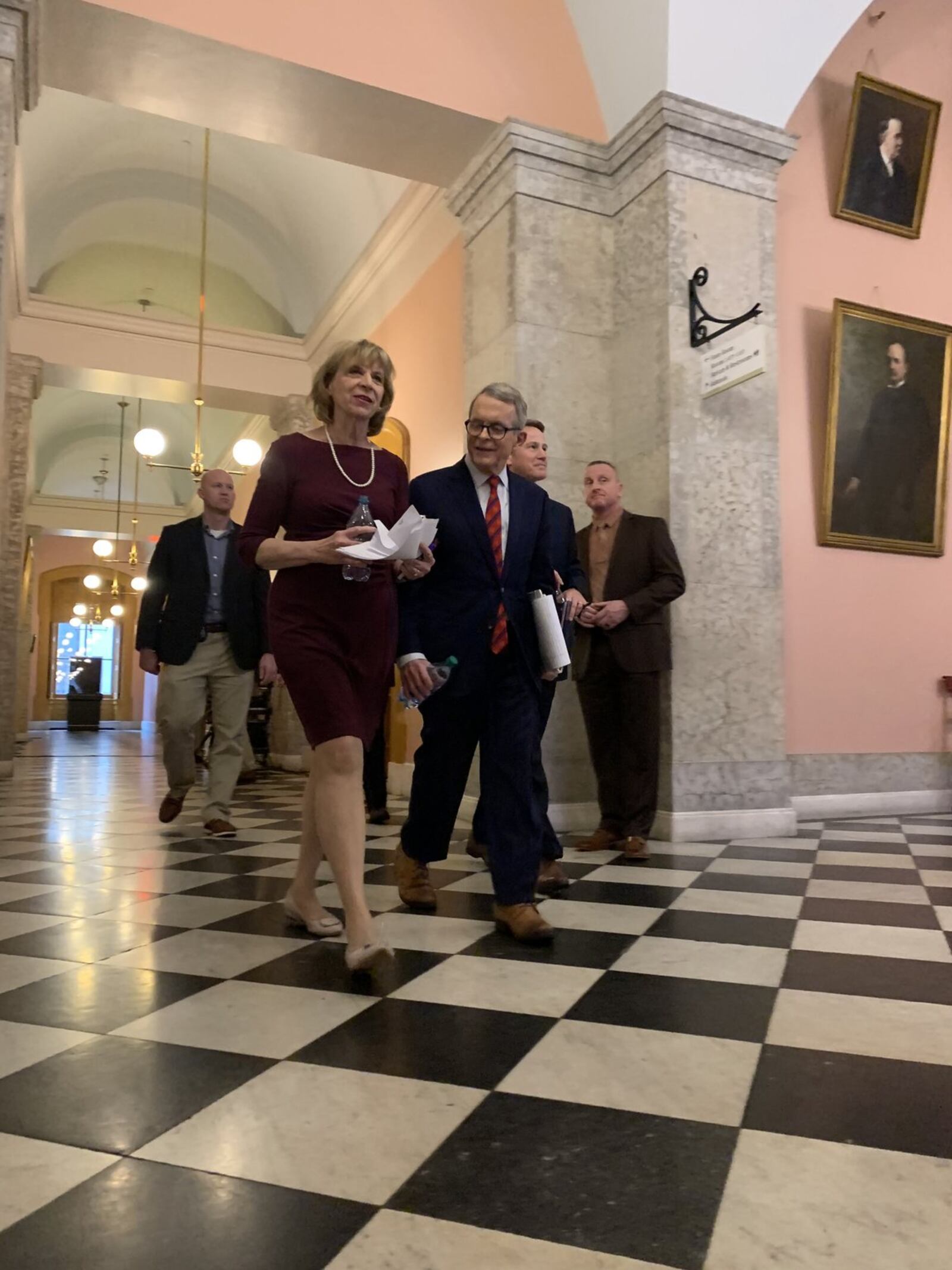 First Lady Fran DeWine and Gov. Mike DeWine leave the daily press briefing on the coronavirus outbreak. LAURA BISCHOFF/STAFF