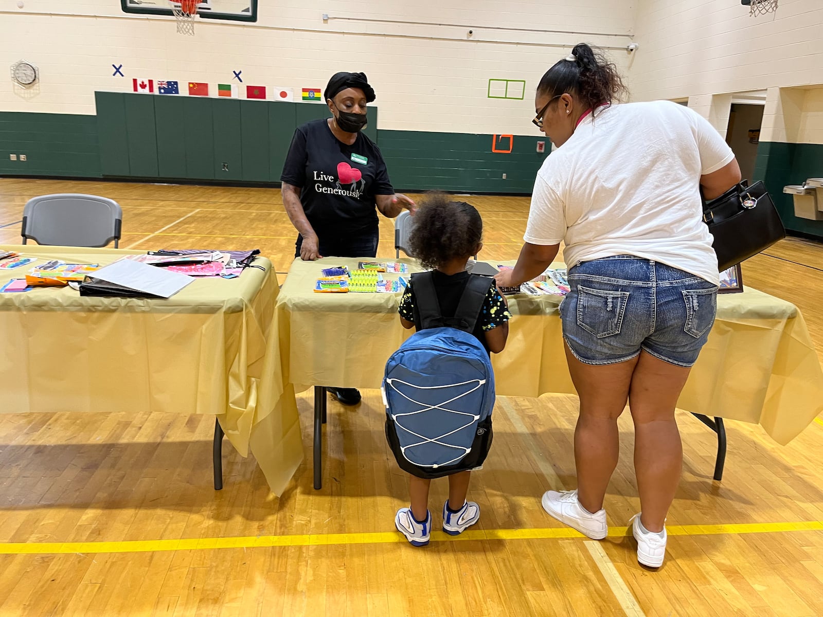 Students at Westwood Elementary School in Dayton picked up donated school backpacks full of school supplies on Aug. 15. Courtesy of Dayton Public Schools.