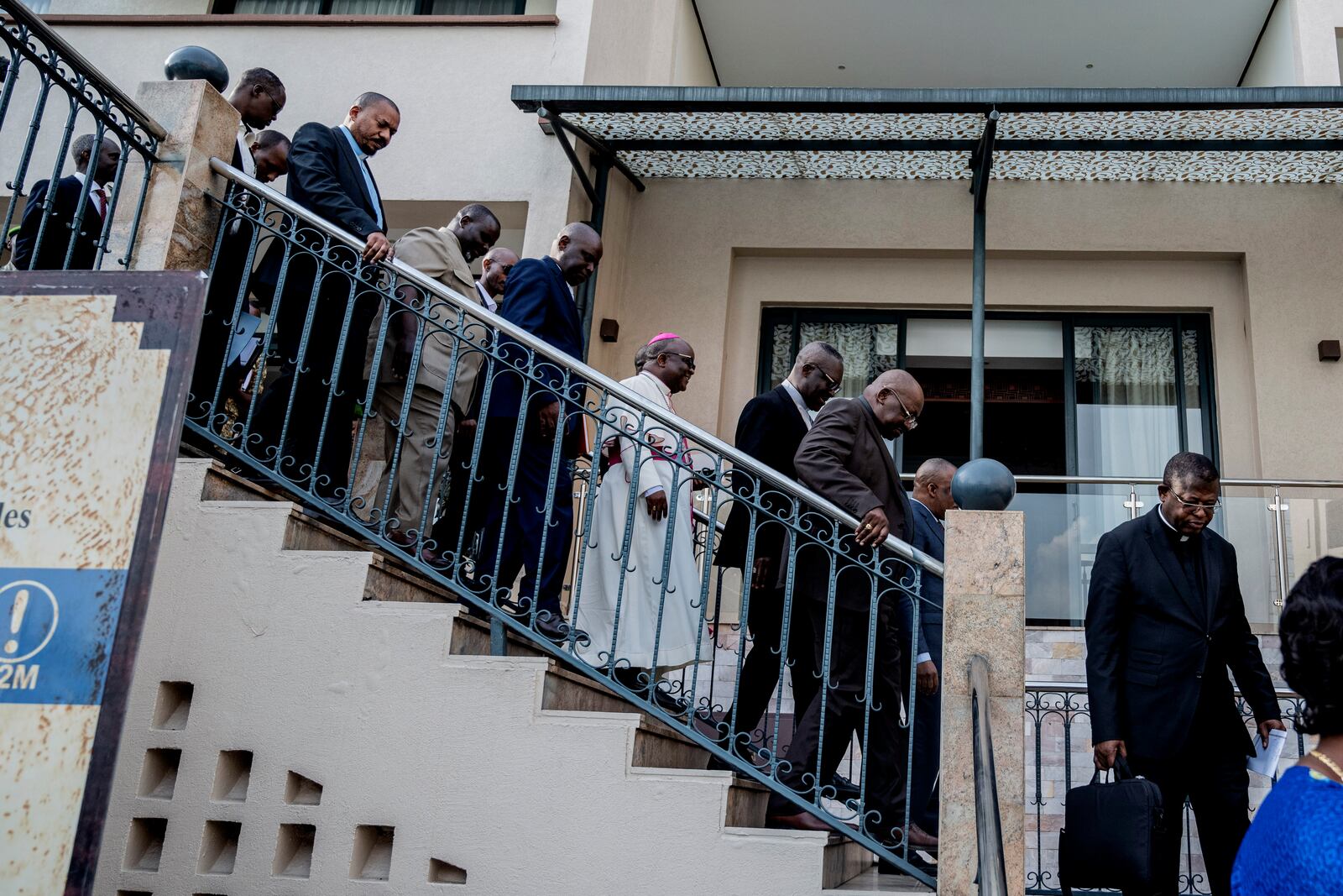 Members of the National Episcopal Conference of Congo and the Church of Christ arrive for a meeting with the Leader of the political military coalition in Goma, Democratic Republic of the Congo, Wednesday, Feb. 12, 2025. (AP Photo/Moses Sawasawa)