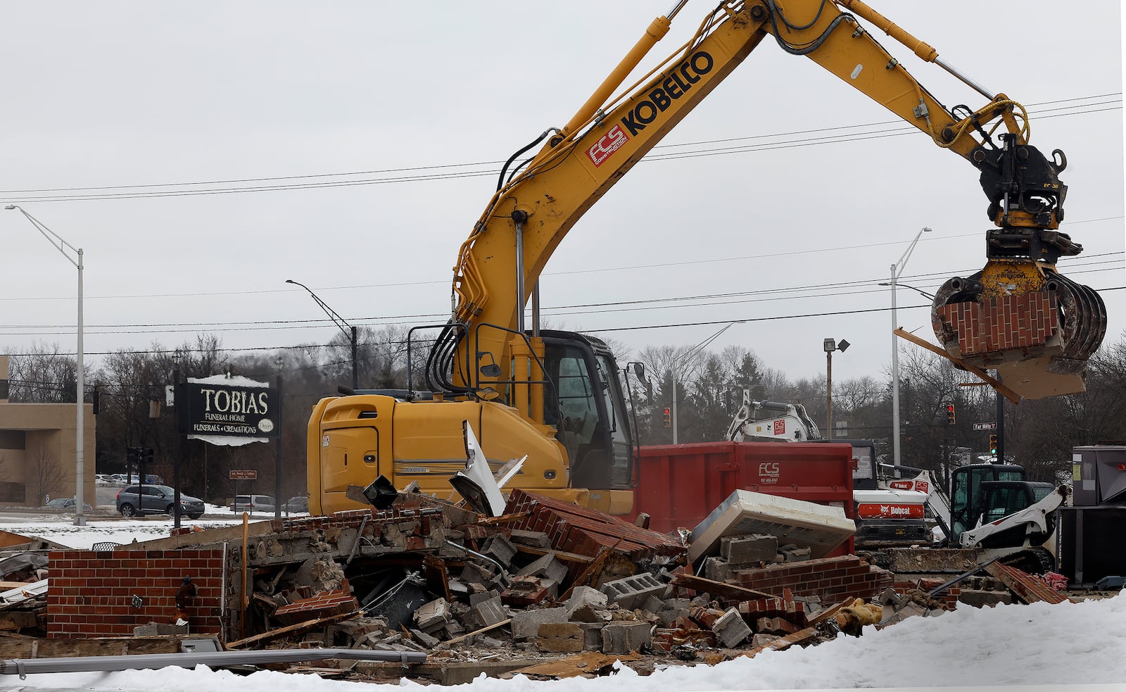 Tobias Funeral Home being demolished on Far Hills Ave. Thursday, Jan. 23, 2025. MARSHALL GORBY\STAFF