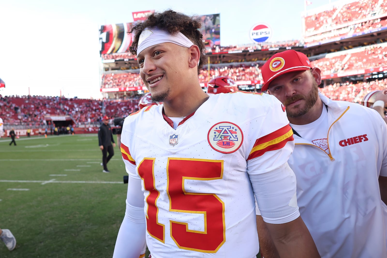 Kansas City Chiefs quarterback Patrick Mahomes (15) smiles after an NFL football game against the San Francisco 49ers in Santa Clara, Calif., Sunday, Oct. 20, 2024. (AP Photo/Jed Jacobsohn)