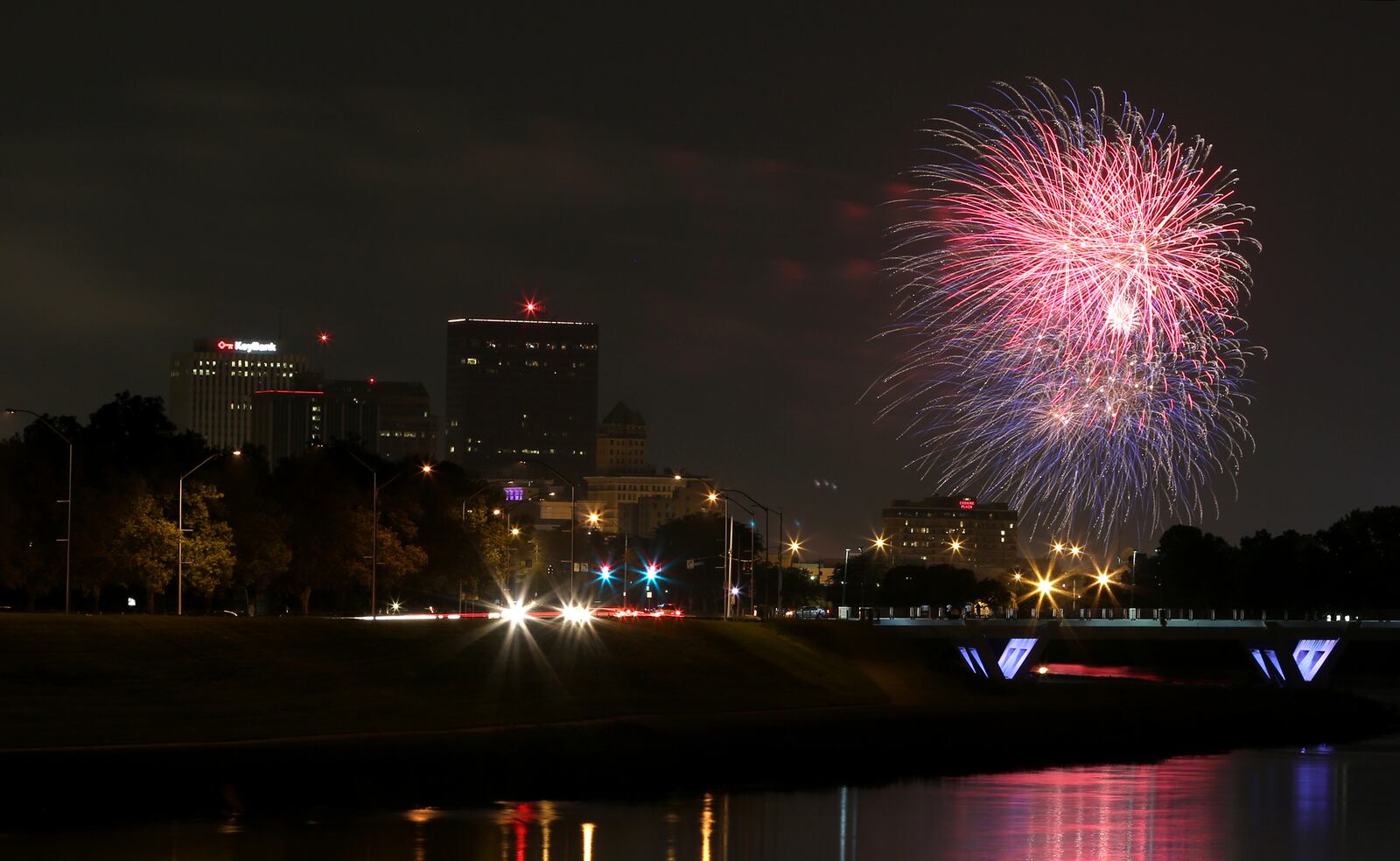 Fireworks burst over the city of Dayton at the culmination of the Dayton Lights In Flight Fireworks Festival. A multi-cultural festival was held downtown at RiverScape MetroPark earlier in the evening that featured food and live entertainment including Alexis Gomez, Son del Caribe, American Bombshells and Damien Lawson. LISA POWELL / STAFF