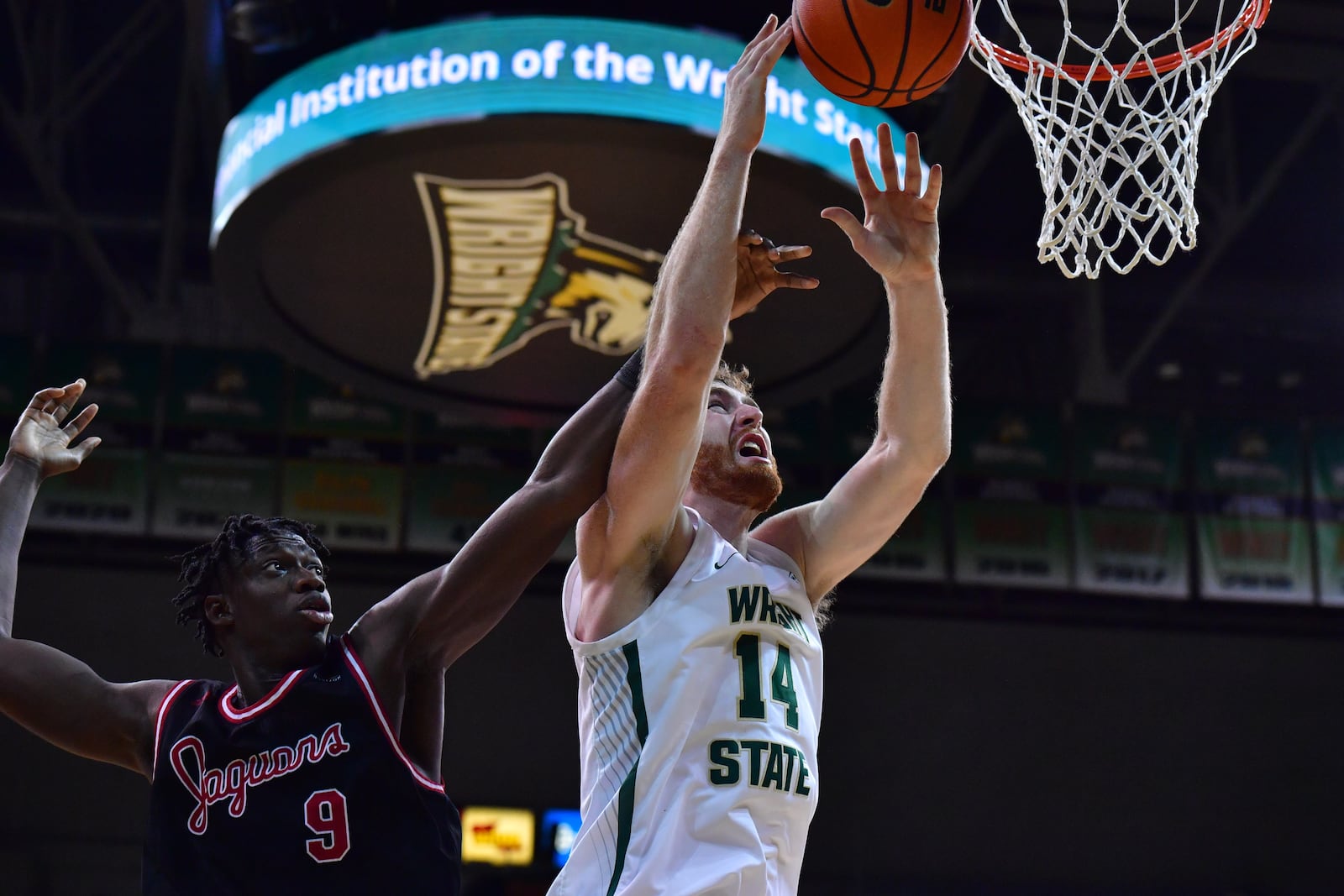 Wright State's Brandon Noel looks to score inside vs. IUPUI's Adbou Samb at the Nutter Center on Nov. 29, 2023. Wright State Athletics photo