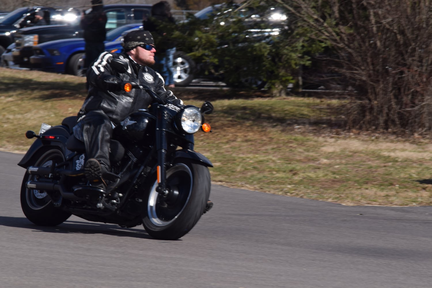 PHOTOS: Thousands of Outlaws attend motorcycle gang leaders funeral at Montgomery County Fairgrounds.