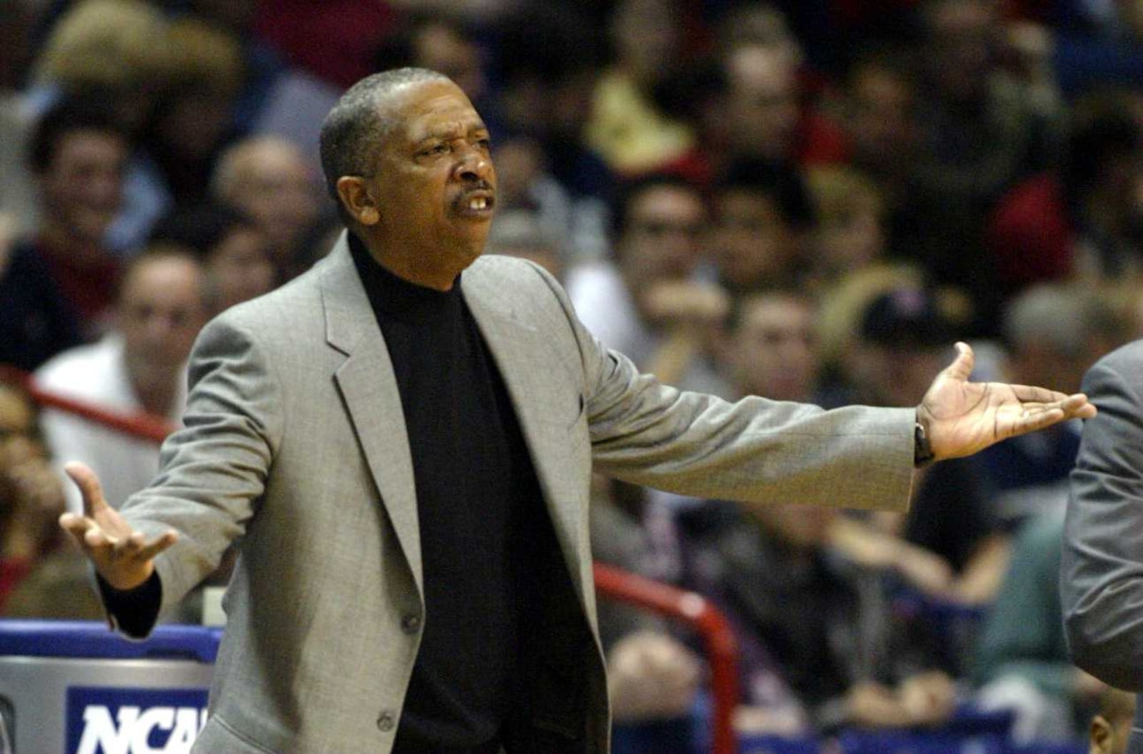 Oliver Purnell shrugs his shoulders in a University of Dayton game against Tulsa. RON ALVEY / STAFF