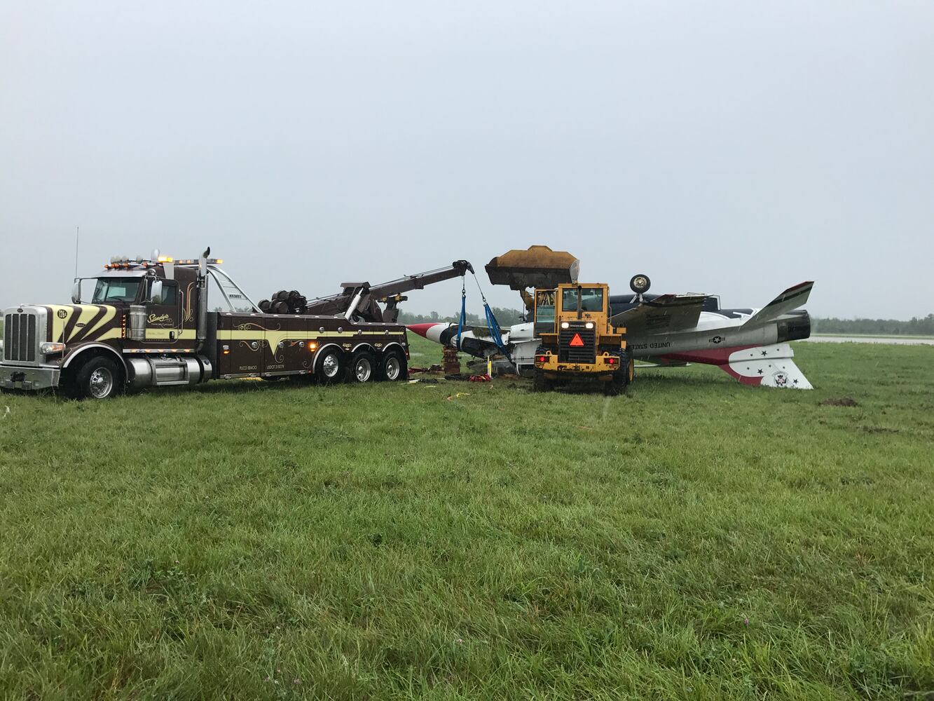 PHOTOS: Thunderbird flips on its top at Dayton Air Show