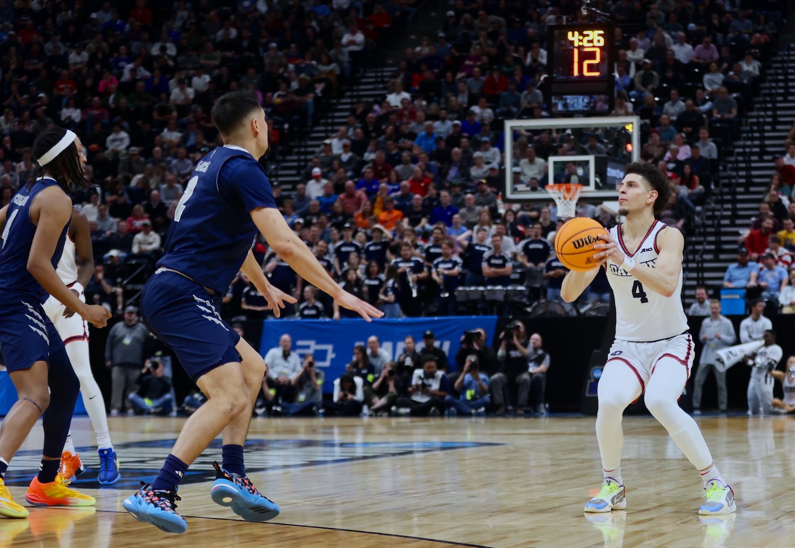 Dayton's Koby Brea prepares to shoot a 3-pointer with Dayton trailing by nine in the second half against Nevada in the first round of the NCAA tournament on Thursday, March 21, 2024, at the Delta Center in Salt Lake City, Utah. David Jablonski/Staff