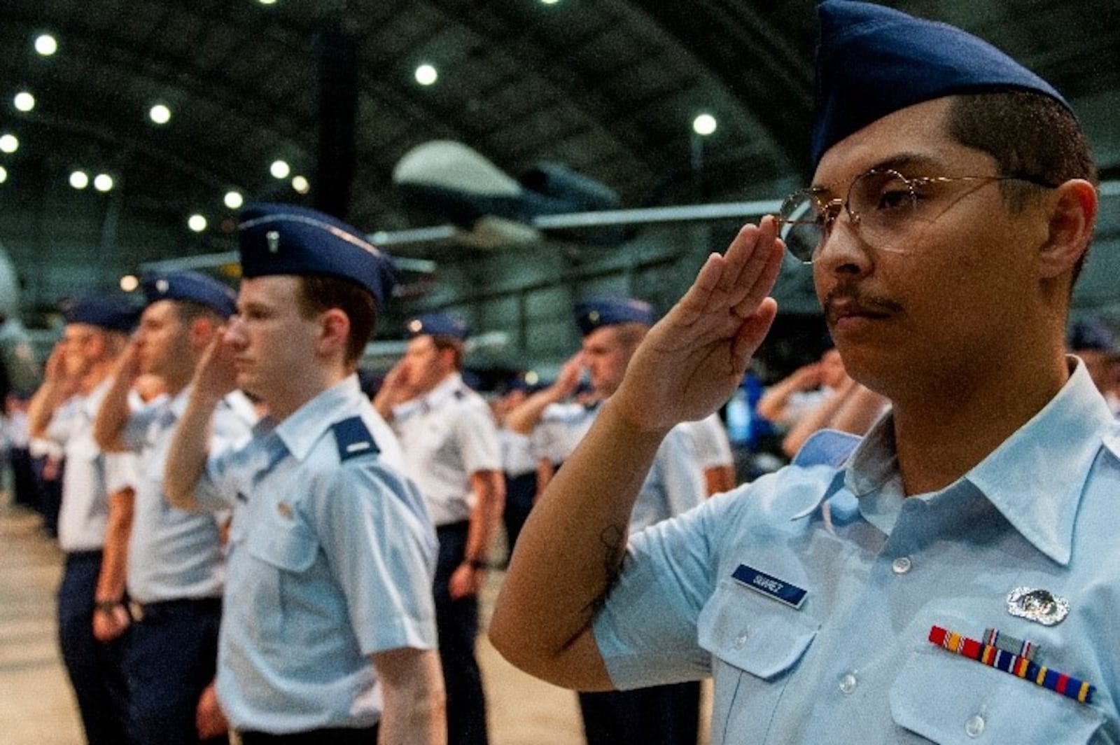 Members of the National Air and Space Intelligence Center render a salute June 2. During the ceremony, Col. Ariel G. Batungbacal took command of NASIC, which serves as the Air Force’s service intelligence center, the nation’s air and space intelligence center, and an operational wing in the Air Force ISR enterprise. U.S. Air Force photo by Staff Sgt. Samuel Earick