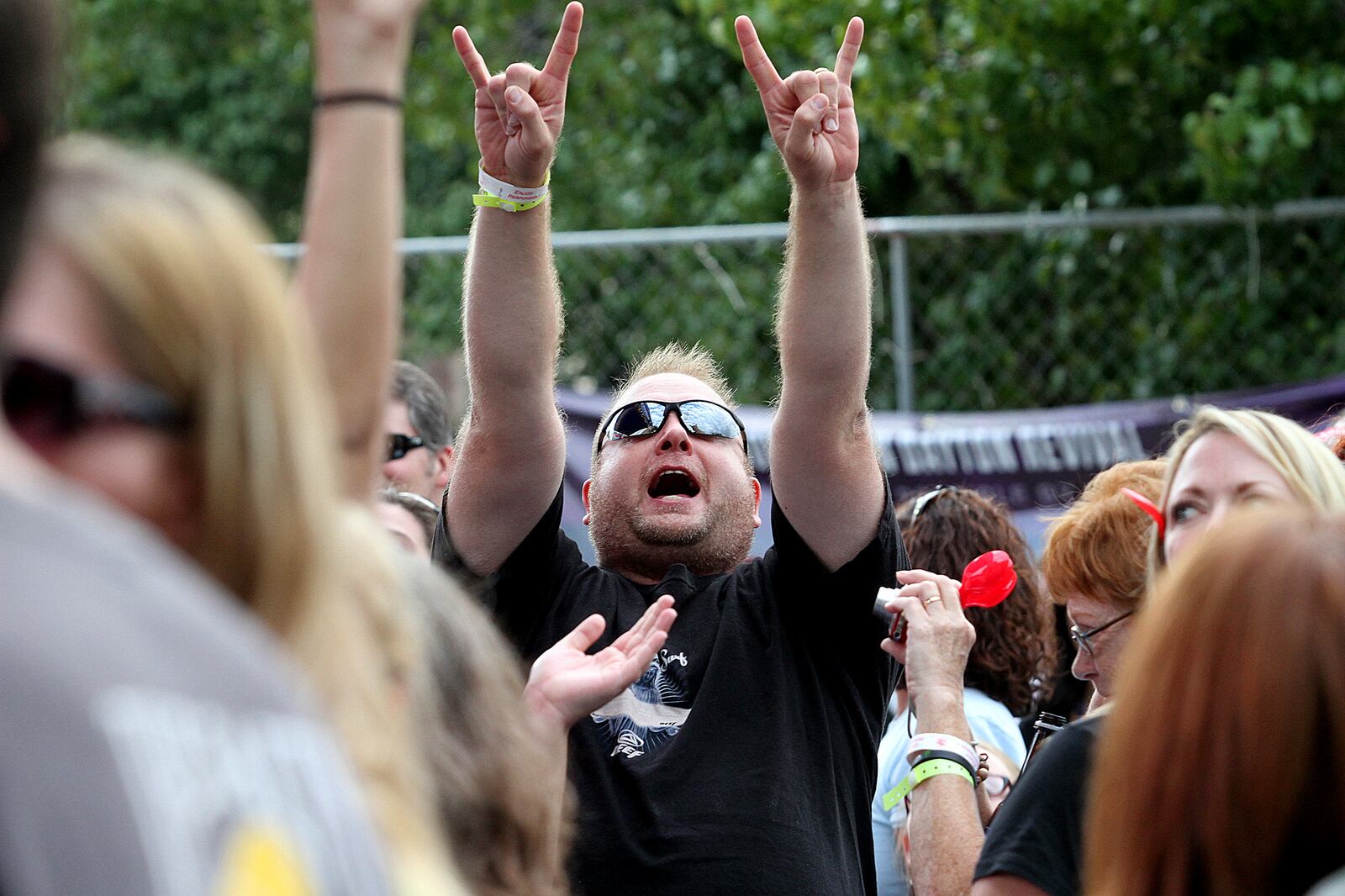 E.L. Hubbard photography A Cowboy Mouth fan shows his enthusiasm during the Downtown Dayton Revival Saturday, Sept. 8, 2012.