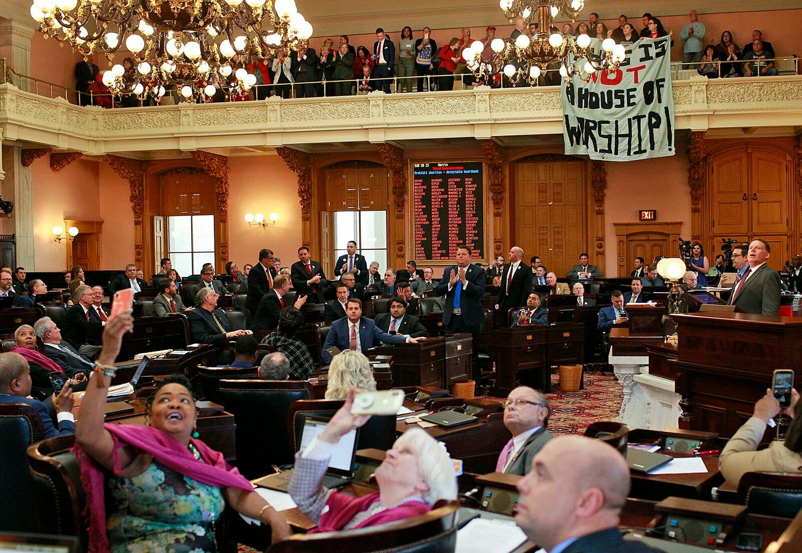 Gov. Mike DeWine speaks before signing a bill imposing one of the nation's toughest abortion restrictions, Thursday, April 11, 2019 in Columbus, Ohio. DeWine's signature makes Ohio the fifth state to ban abortions after the first detectable fetal heartbeat. That can come as early as five or six weeks into pregnancy, before many women know they're pregnant.