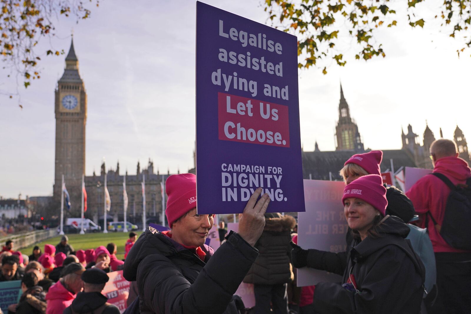 Pro legal assisted dying supporters demonstrate in front of Parliament in London, Friday, Nov. 29, 2024 as British lawmakers started a historic debate on a proposed to help terminally ill adults end their lives in England and Wales.(AP Photo/Alberto Pezzali)