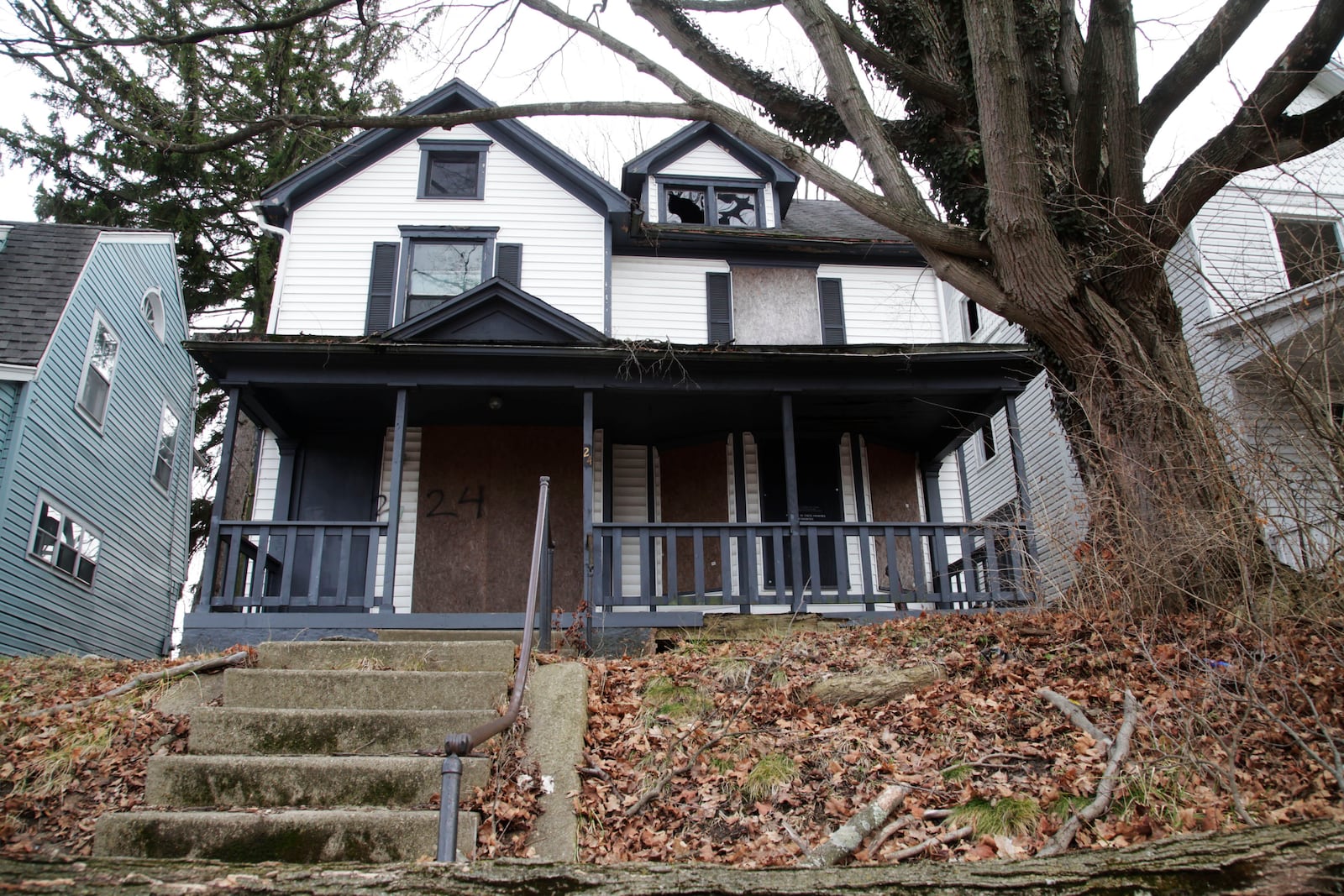 Jasmine Wadsworth, 39, of Huber Heights was found shot to death June 21, 2017 behind this vacant house at 24 W. Norman Ave., Dayton. The cause of death is homicide.STAFF Byron Stirsman