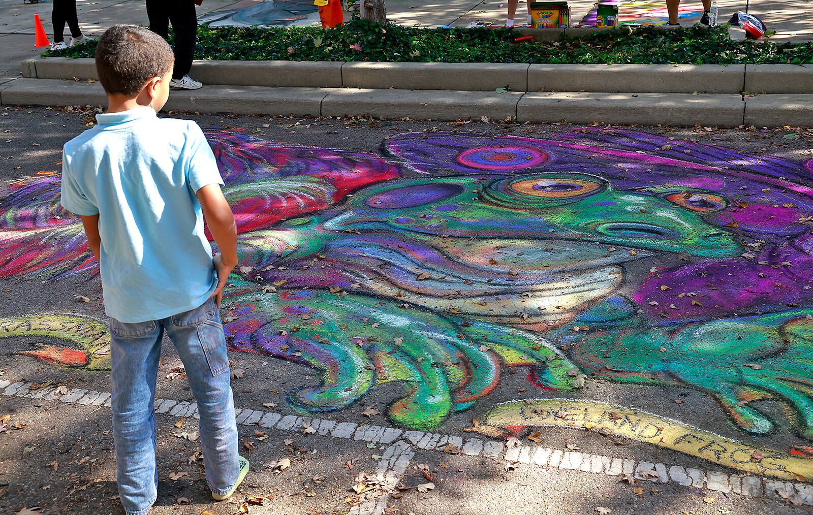 Dozens of amateur and professional artists from around the area showed off their skill on the sidewalks and streets surrounding  National Roard Commons Park for ChalkFest Saturday, Oct. 5, 2024.. ChalkFest also featured live music, food trucks and creative activities for the kids. BILL LACKEY/STAFF