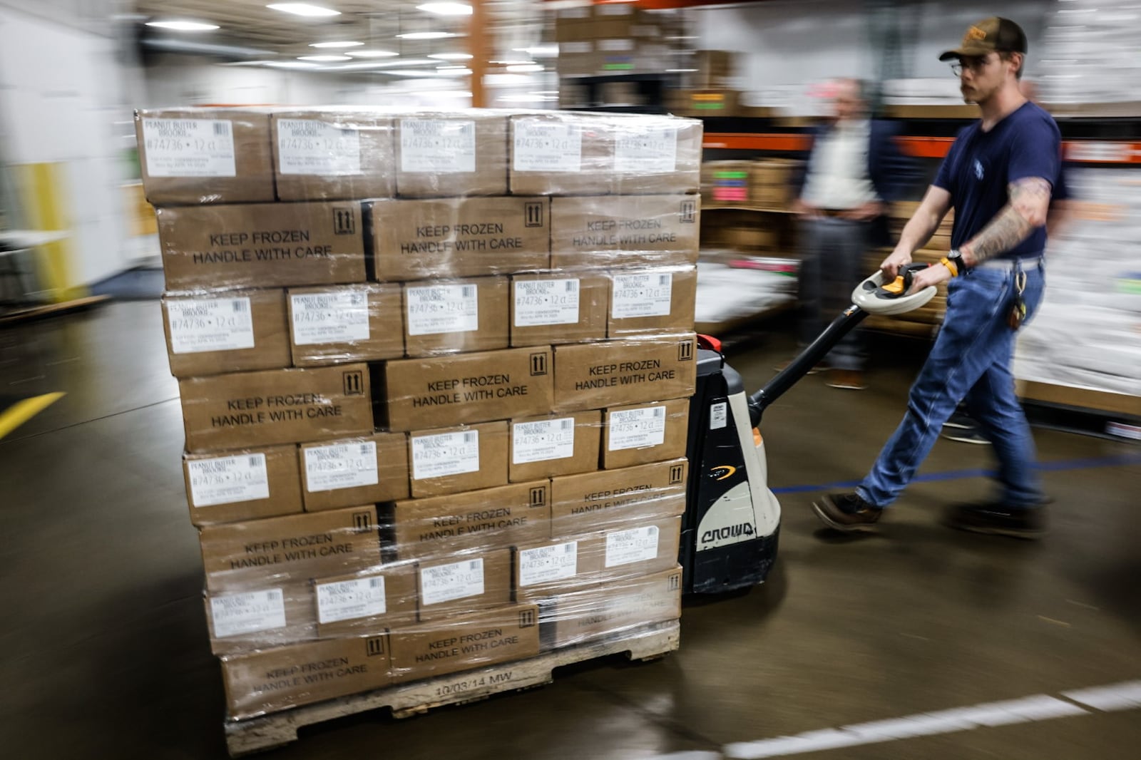 A forklift full of killer brownies is moved into a semitruck at the plant in Miamisburg. JIM NOELKER/STAFF