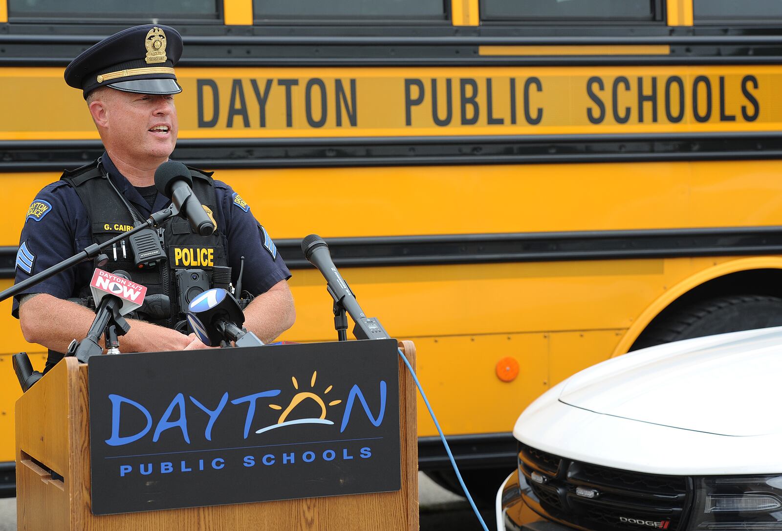 Dayton Police Sgt. Gordon Cairns spoke Monday Aug. 16, 2021, during a press conference at Dunbar High School held by Dayton Public Schools and the Dayton Police Department to discussed back-to-school and traffic safety.  MARSHALL GORBY\STAFF