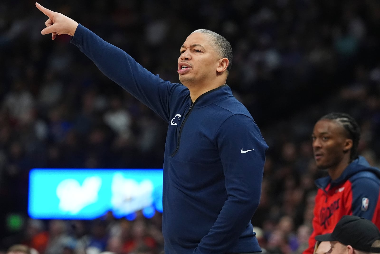 Los Angeles Clippers head coach Tyronn Lue directs his team against the Denver Nuggets in the first half of an NBA basketball game Friday, Dec. 13, 2024, in Denver. (AP Photo/David Zalubowski)