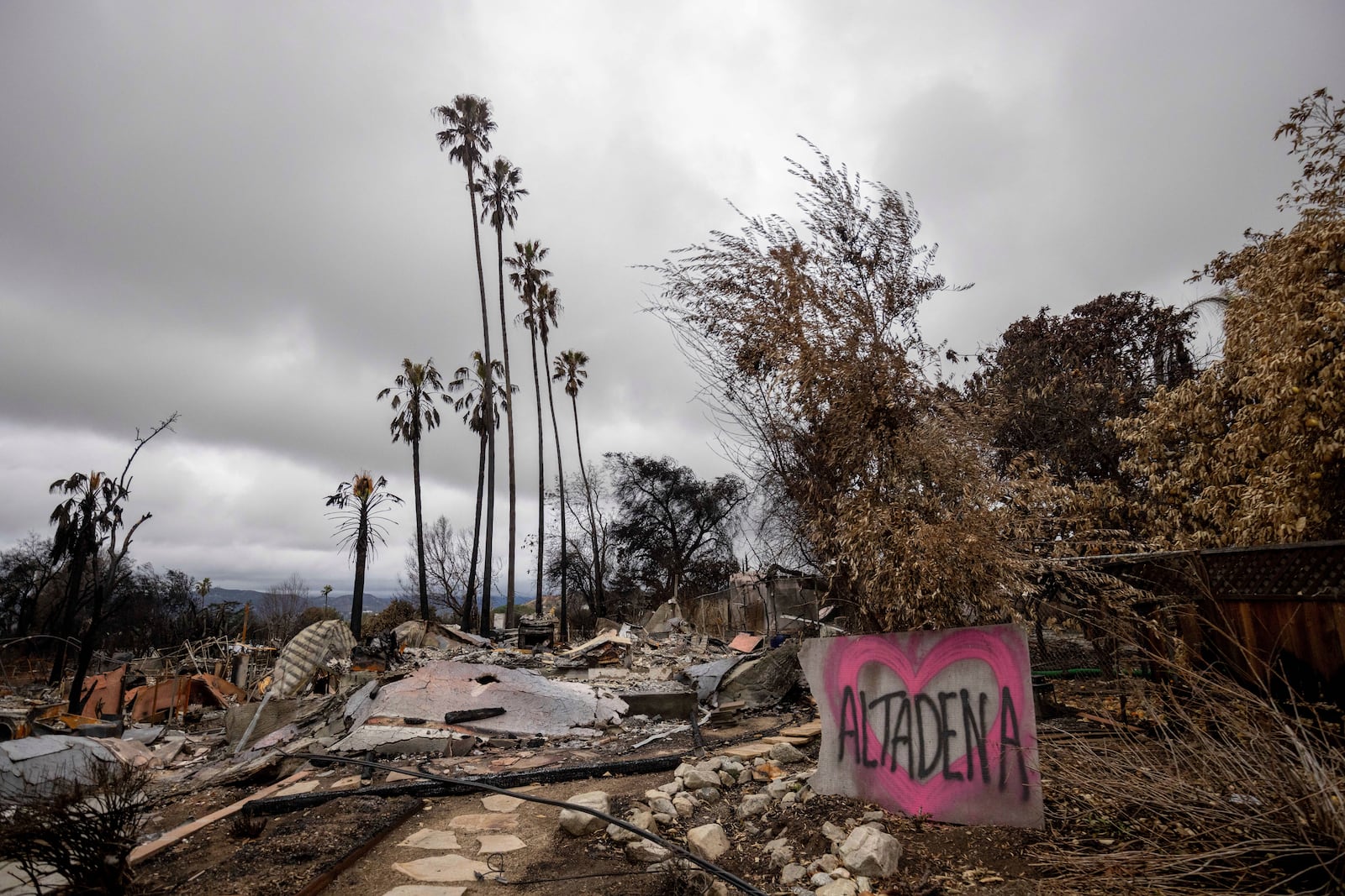 FILE - A property burned by the Eaton Fire is seen Thursday, Feb. 6, 2025, in Altadena, Calif. (AP Photo/Ethan Swope, File)