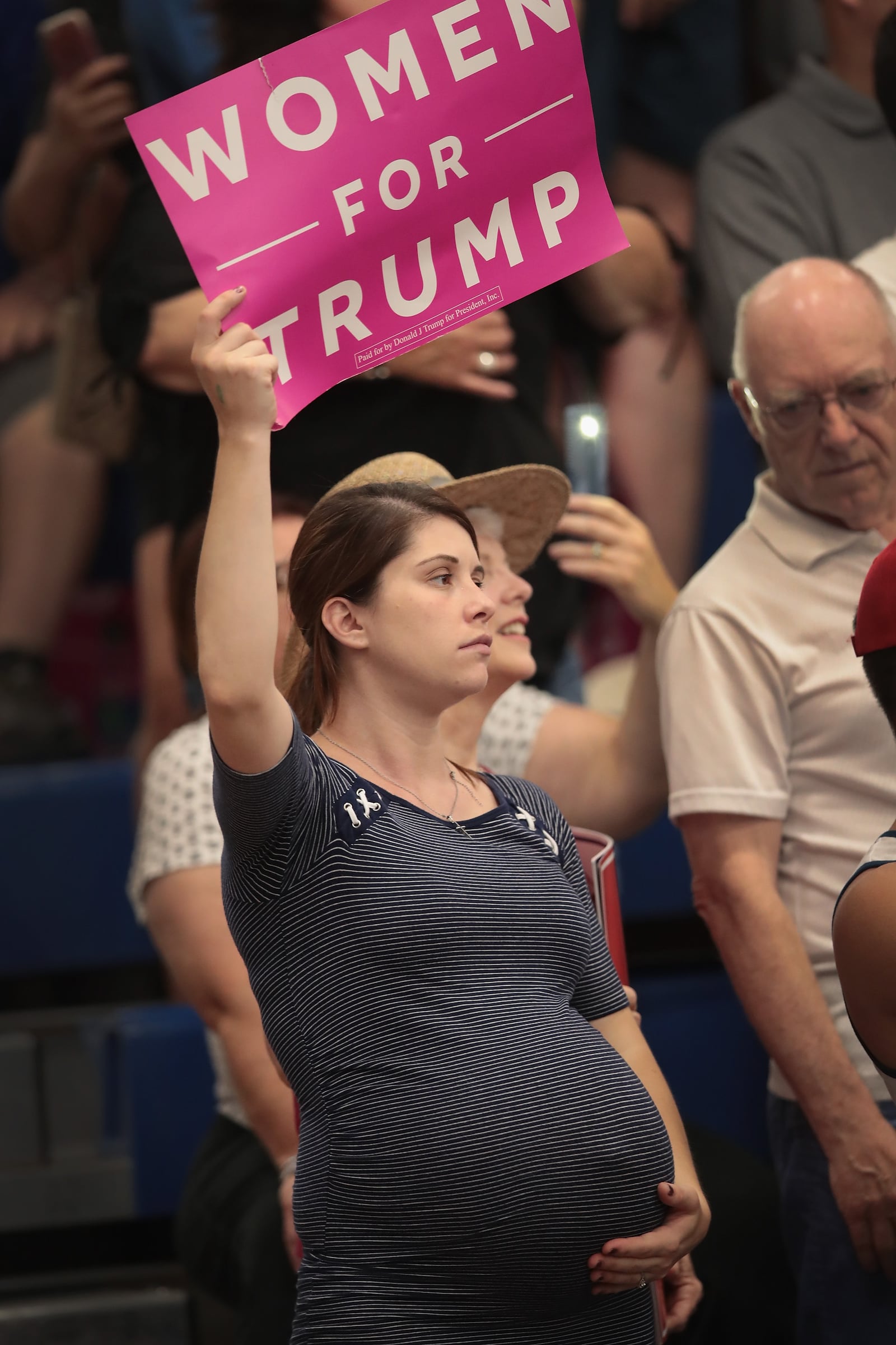 Guests listen as President Donald Trump speaks at a rally to show support for Ohio Republican congressional candidate Troy Balderson on August 4, 2018 in Lewis Center, Ohio. Balderson faces Democratic challenger Danny O’Connor for Ohio’s 12th Congressional District on Tuesday. (Photo by Scott Olson/Getty Images)