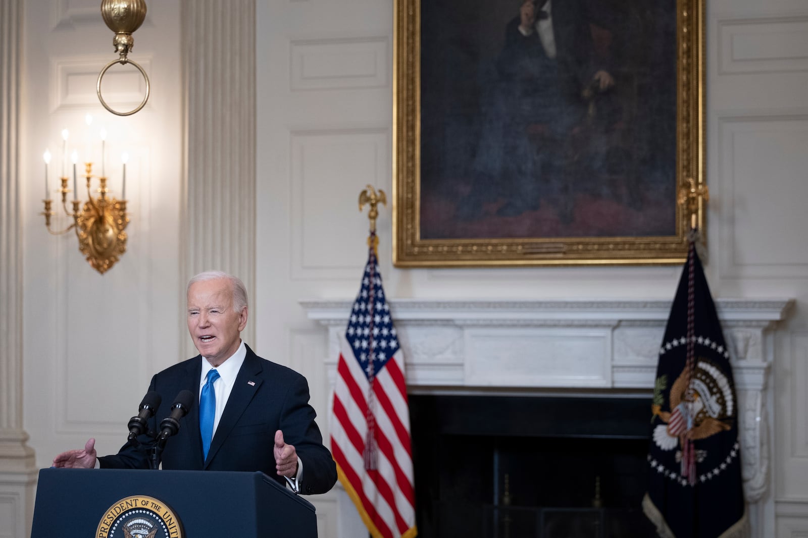 
                        President Joe Biden delivers remarks on the Senate's passage of a security spending bill that would aid Israel and Ukraine at the State Dining Room of the White House in Washington, Feb. 13, 2024. President Biden denounced former President Donald Trump on Tuesday for encouraging Russia to attack some NATO allies, as he implored House Republicans to defy their putative nominee and pass new security aid for Ukraine and Israel. (Tom Brenner/The New York Times)
                      