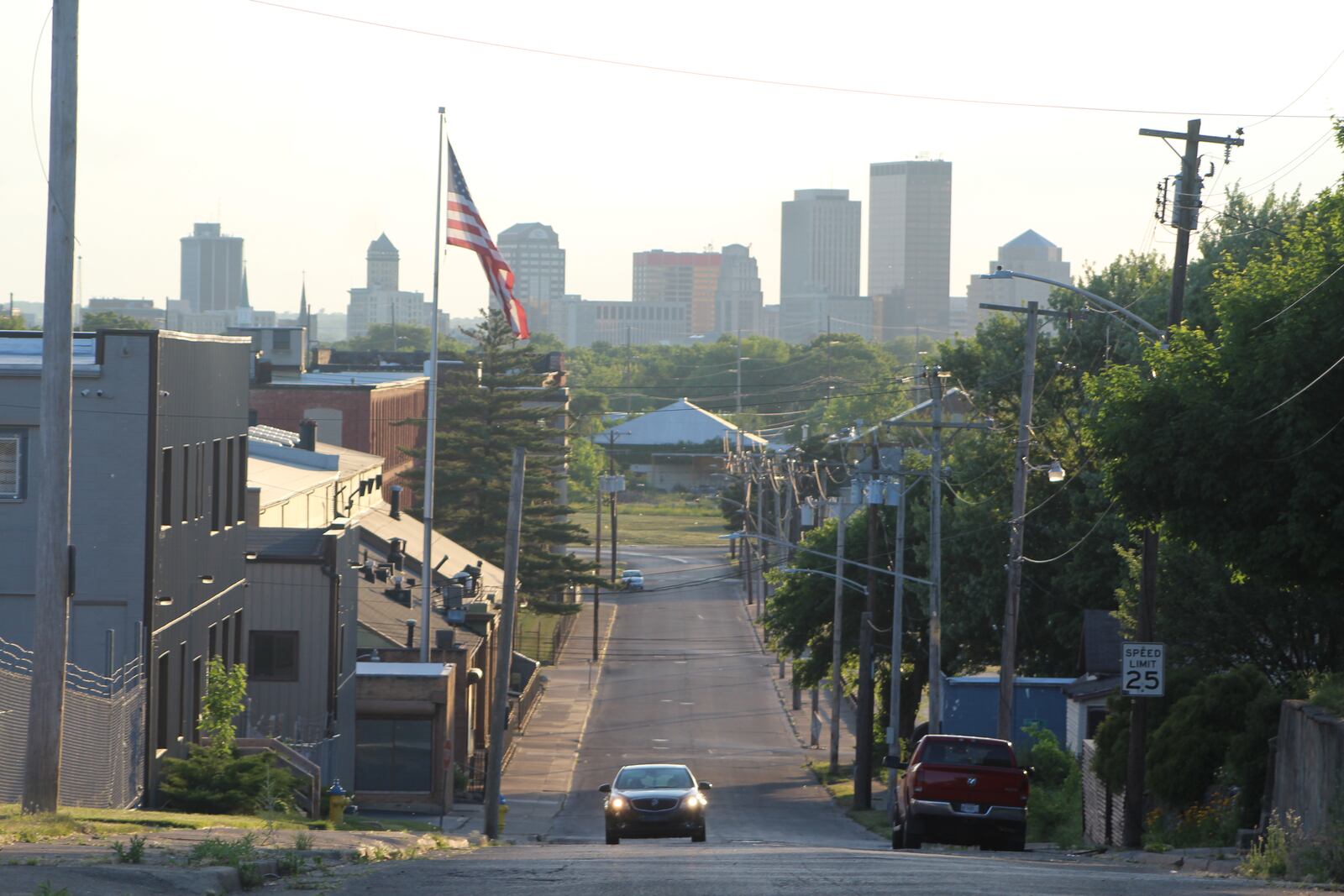 A car drives east on Davis Avenue, by Meridian Street and Dayton Bag & Burlap. A Meridian Street resident said someone last month drove extremely fast down her street, failed to stop at the stop sign at Davis Street and nearly crashed into Dayton Bag & Burlap. CORNELIUS FROLIK / STAFF