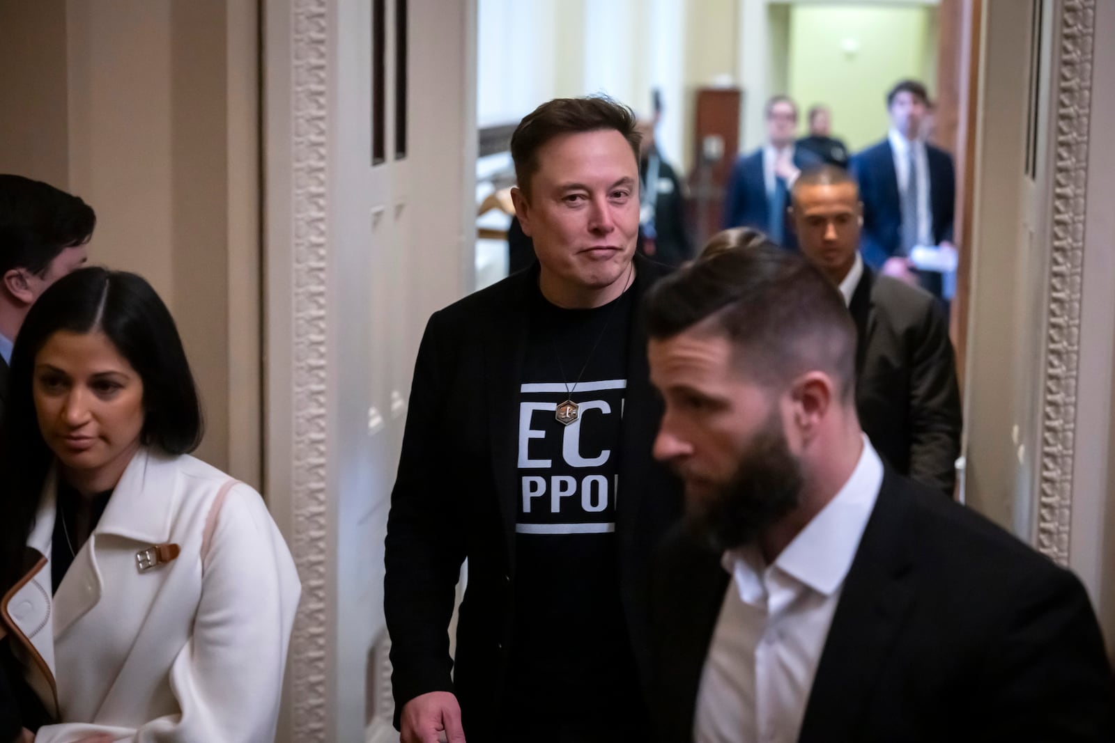 Elon Musk leaves after meeting with Senate Republicans, at the Capitol in Washington, Wednesday, March 5, 2025. (AP Photo/Ben Curtis)