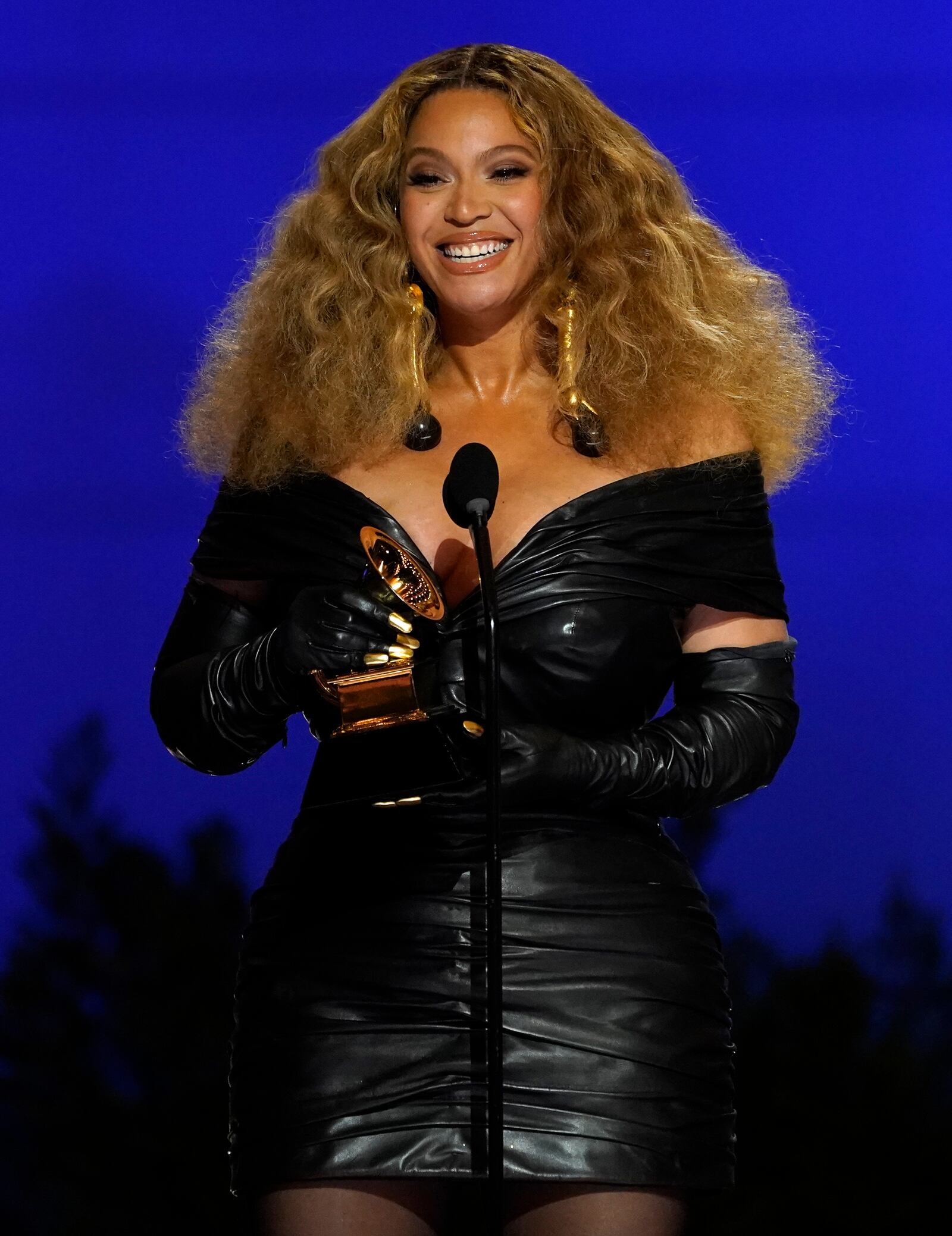 FILE - Beyonce accepts the award for best R&B performance for "Black Parade" at the 63rd annual Grammy Awards in Los Angeles March 14, 2021. (AP Photo/Chris Pizzello, File)