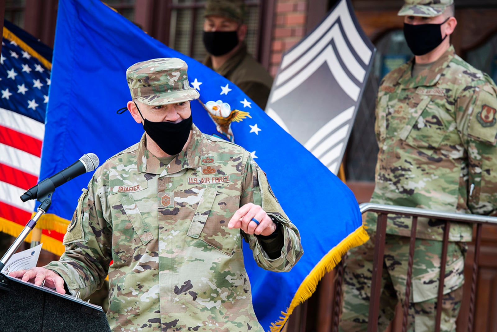 Chief Master Sgt. Jason Shaffer, 88th Air Base Wing command chief, provides opening remarks during the 2021 Chief Master Sgt. Drive Through celebration outside the club at Wright-Patterson Air Force Base Dec 9. U.S. AIR FORCE PHOTO/WESLEY FARNSWORTH