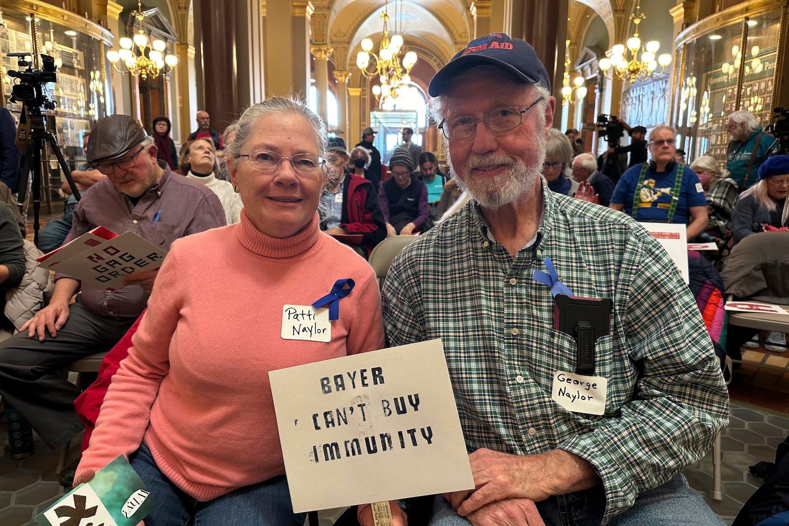 Patti and George Naylor of Churdan, Iowa, join a Feb. 10, 2025, rally in Des Moines, Iowa, to oppose a bill that would protect pesticide companies from lawsuits that claim its popular weedkiller causes cancer. (AP Photo/Hannah Fingerhut)