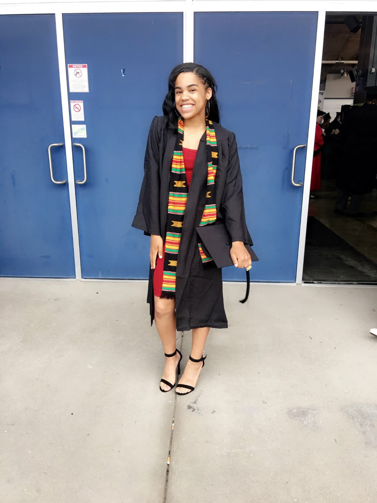 Ashli Garnett  is the first student at Paul Laurence Dunbar Early College High School to earn an Sinclair Community College associate's degree as part of a partnership between the high school and the college.