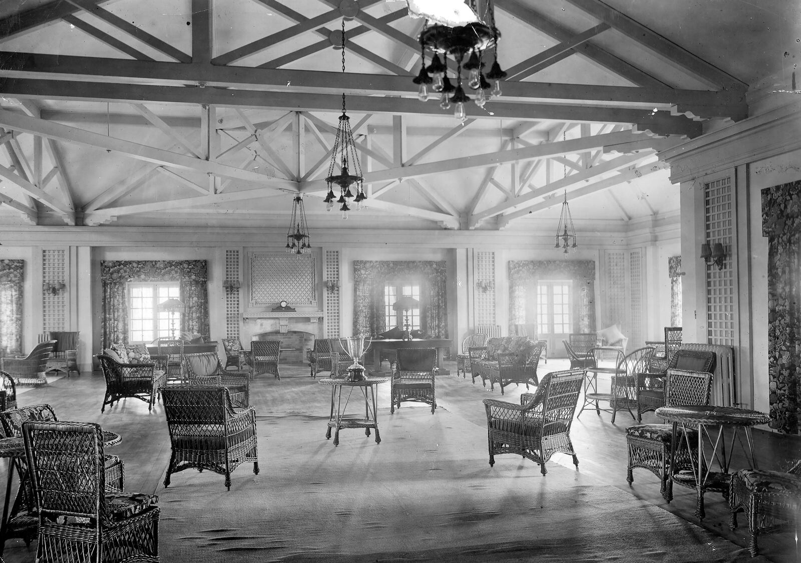 The Assembly Room of the Dayton Country Club photographed in 1910. Newspaper accounts described grand reception areas for men and women, furniture made from silver gray oak with ivory woodwork and a Japanese tea room decorated with a mural that depicted mountains, foliage and Geisha girls. DAYTON DAILY NEWS ARCHIVE