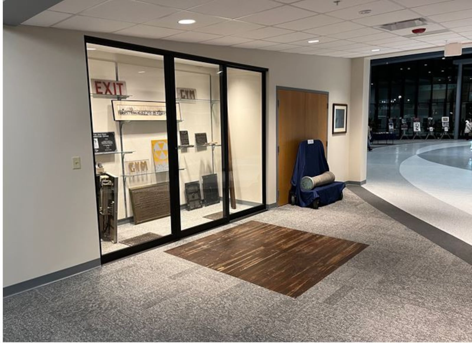 Cherishing the past of the Wayne Local Schools is a feature of the new Performing Arts Center. This display shows various items from previous buildings in the district. The wood flooring from the 1915 building still creaks as it did years ago. ED RICHTER/STAFF