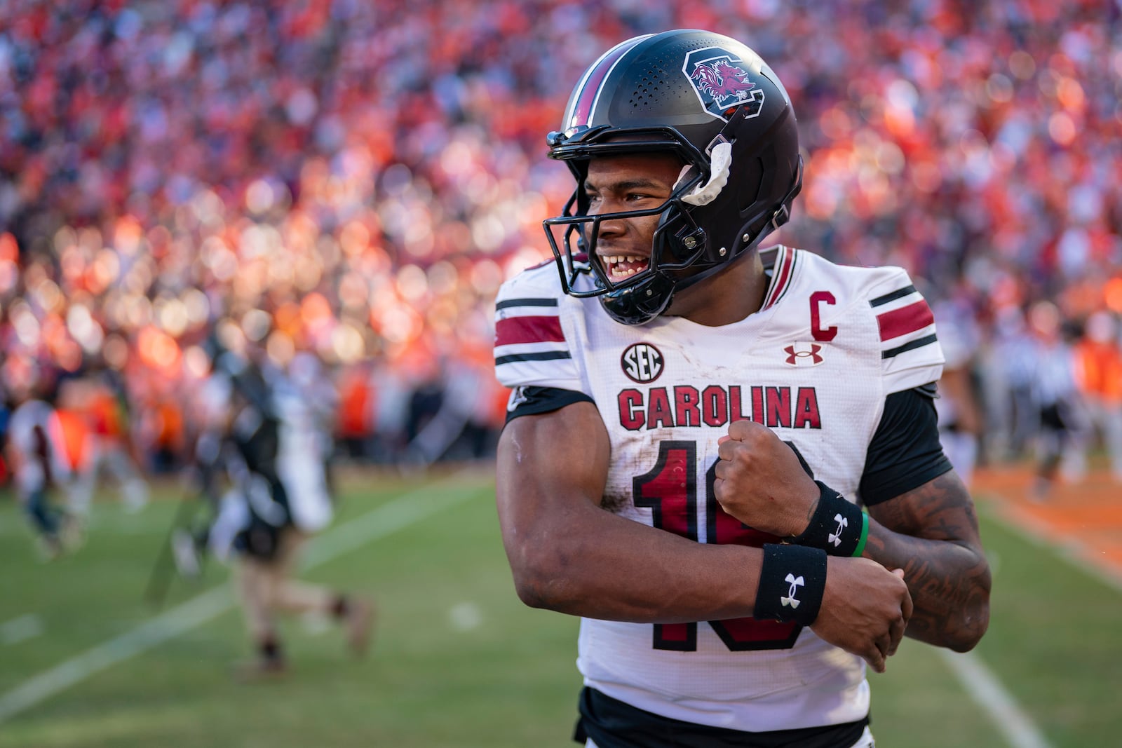 South Carolina quarterback LaNorris Sellers (16) celebrates after defeating Clemson in an NCAA college football game Saturday, Nov. 30, 2024, in Clemson, S.C. (AP Photo/Jacob Kupferman)